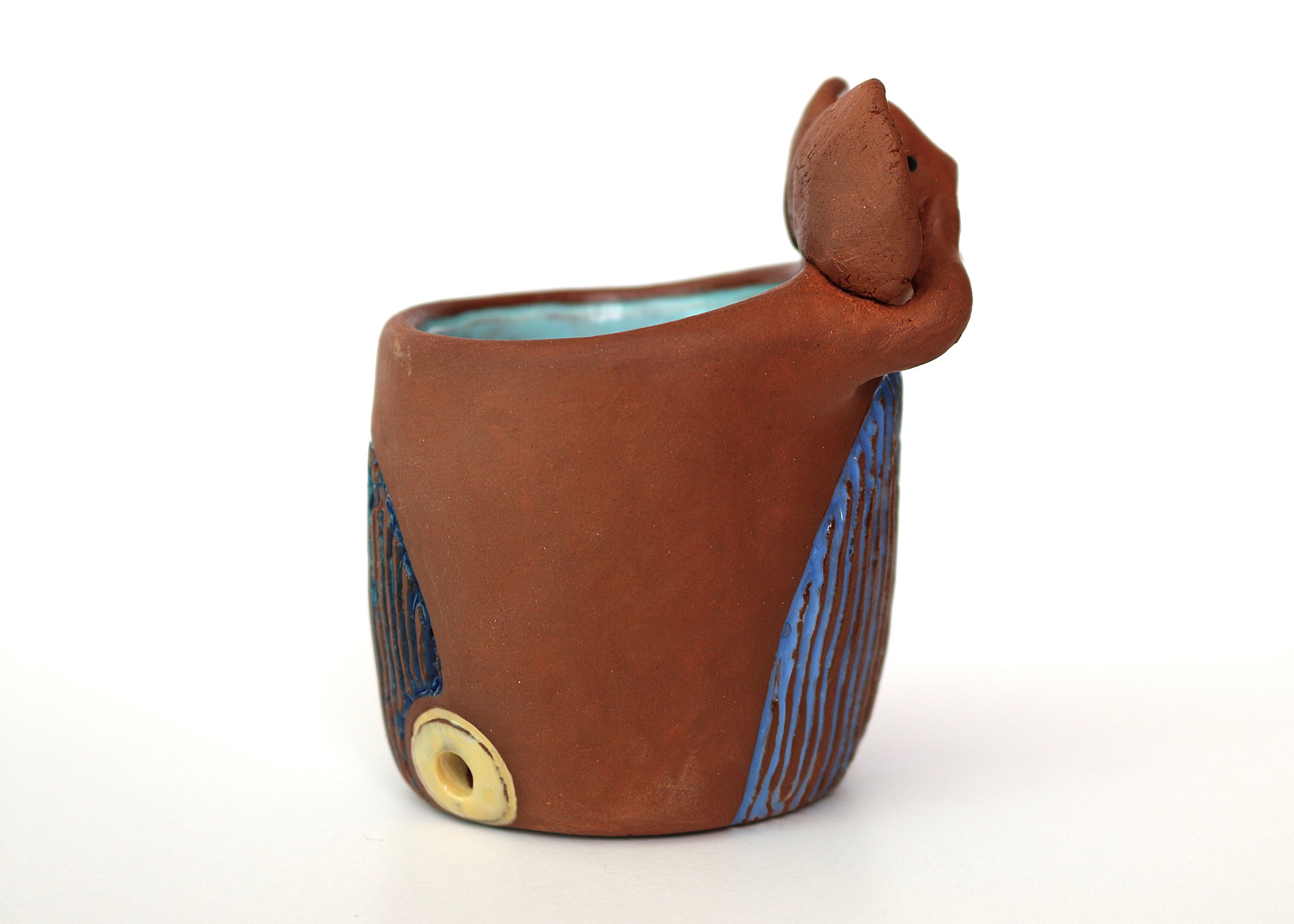 Tell Me Everything, 2025, 3 x 2.5 x 2 inches, earthenware, electric-fired, cone 02

(A whistle cup that wheedles out your deepest confessions.)