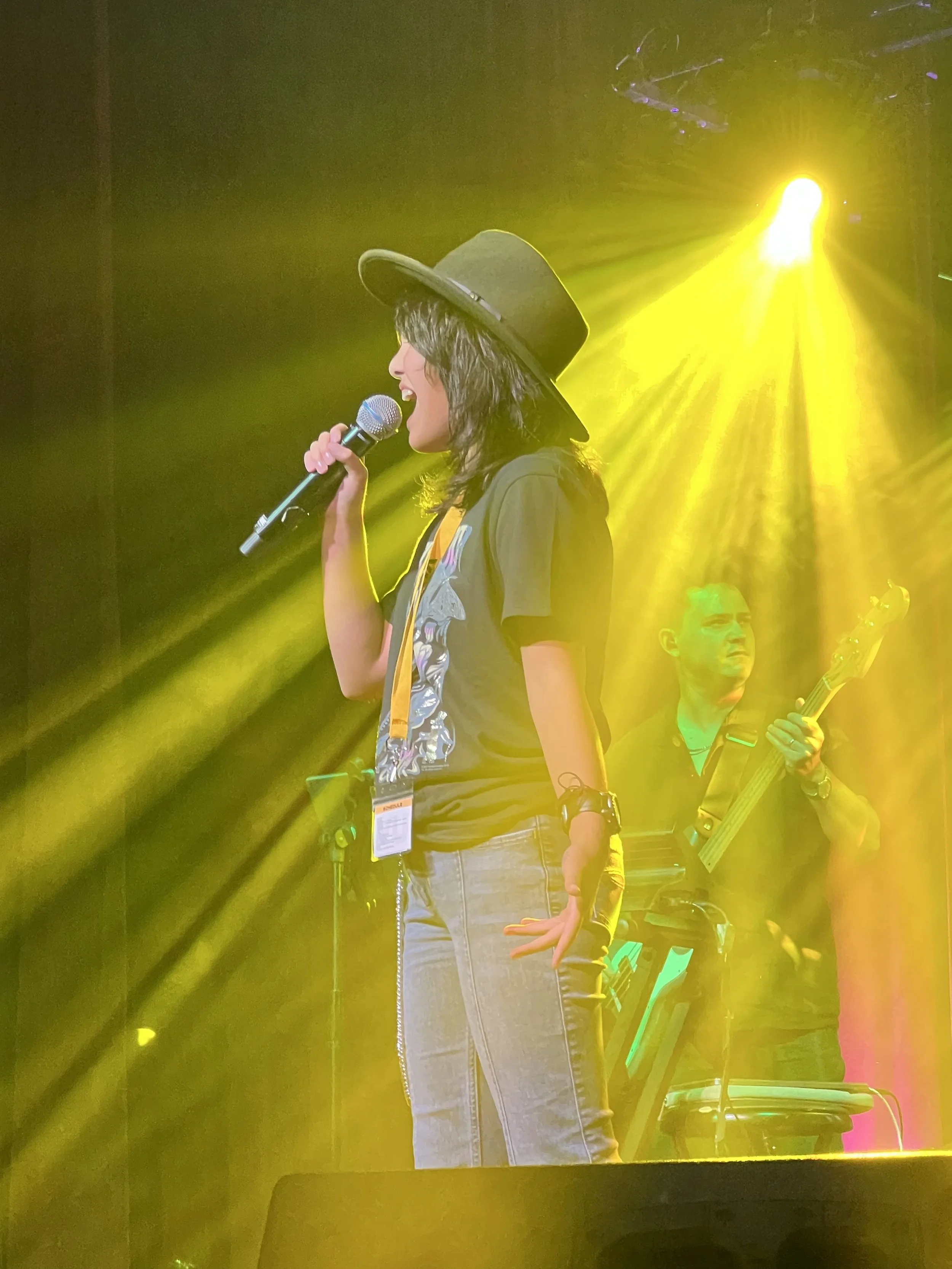 Female singer songwriter, Morgan Emslie, performing Fleetwood Mac "The Chain" at VocalizeU showcase. Morgan performs as @amped2howl