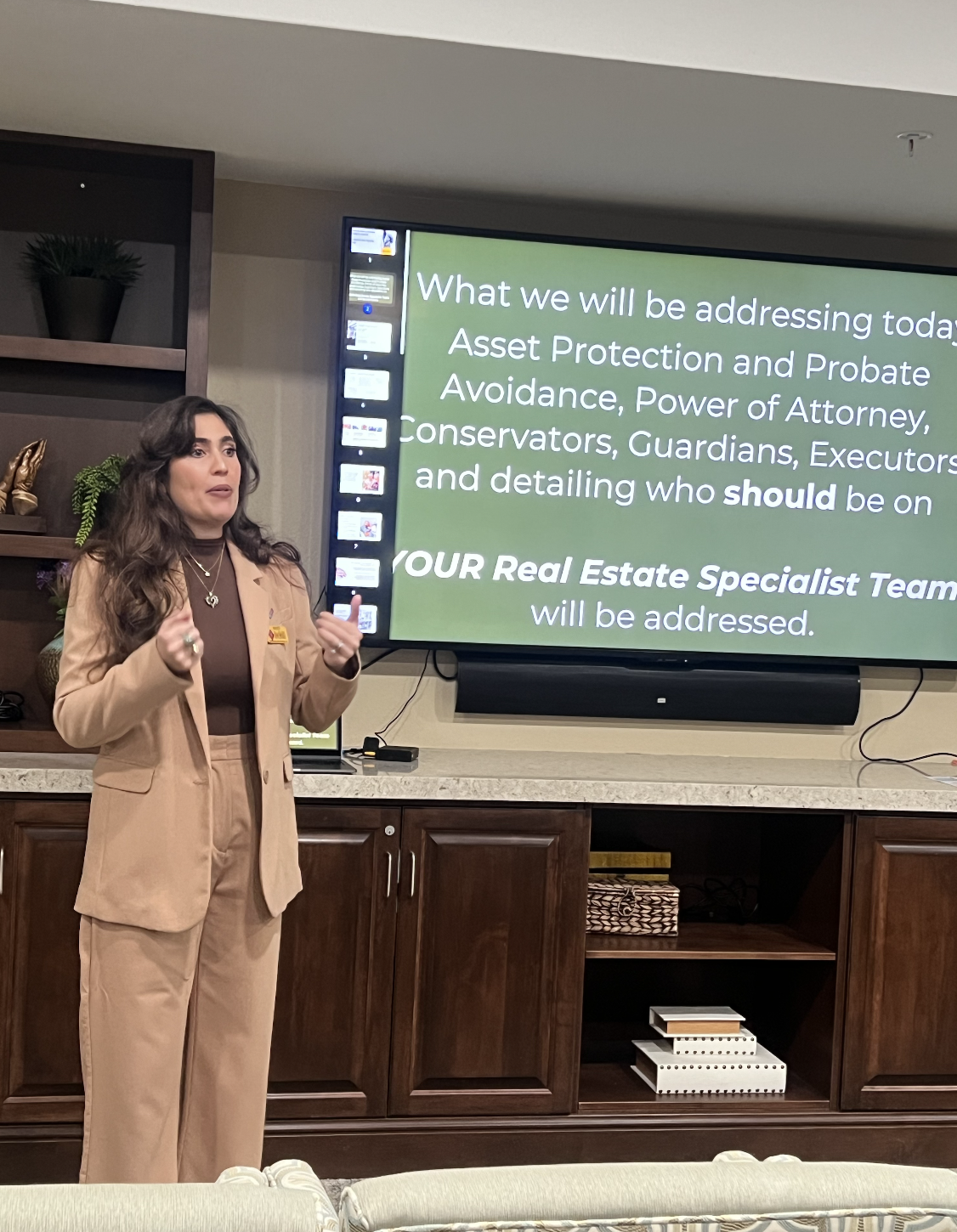 Image of Kristy Cartee standing and presenting