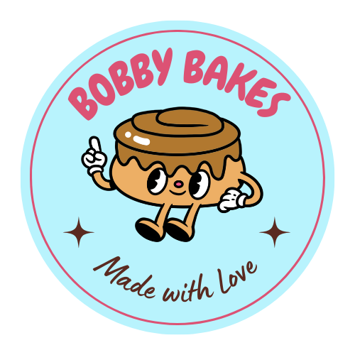Logo of Bobby Bakes featuring a cartoon brownie with a face, arms, and legs, holding up one finger, with the text 'Bobby Bakes' above and 'Made with Love' below.