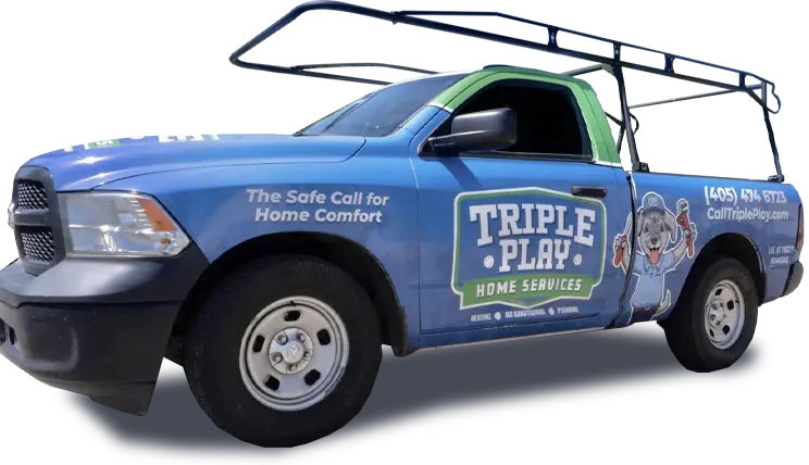 Service truck with signage for Triple Play Home Services, featuring a mascot bear, contact information, and tagline about home comfort.