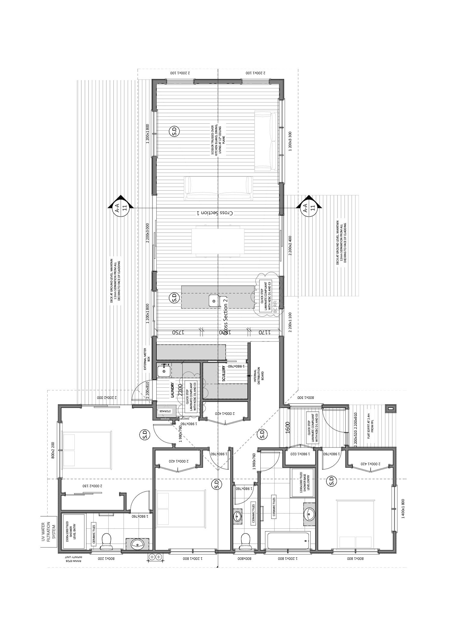 Architectural floor plan of a residential house showing bedrooms, bathrooms, laundry room, kitchen, living area, and outdoor deck.