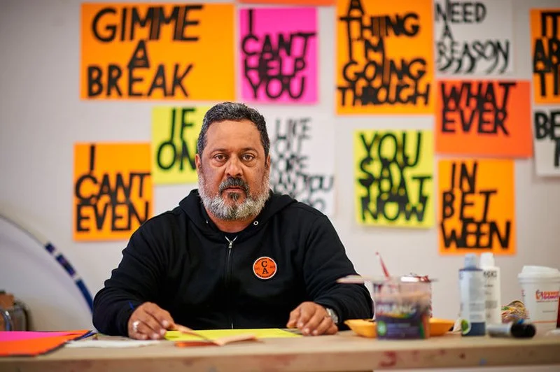 seated-by-protest-signs.jpg