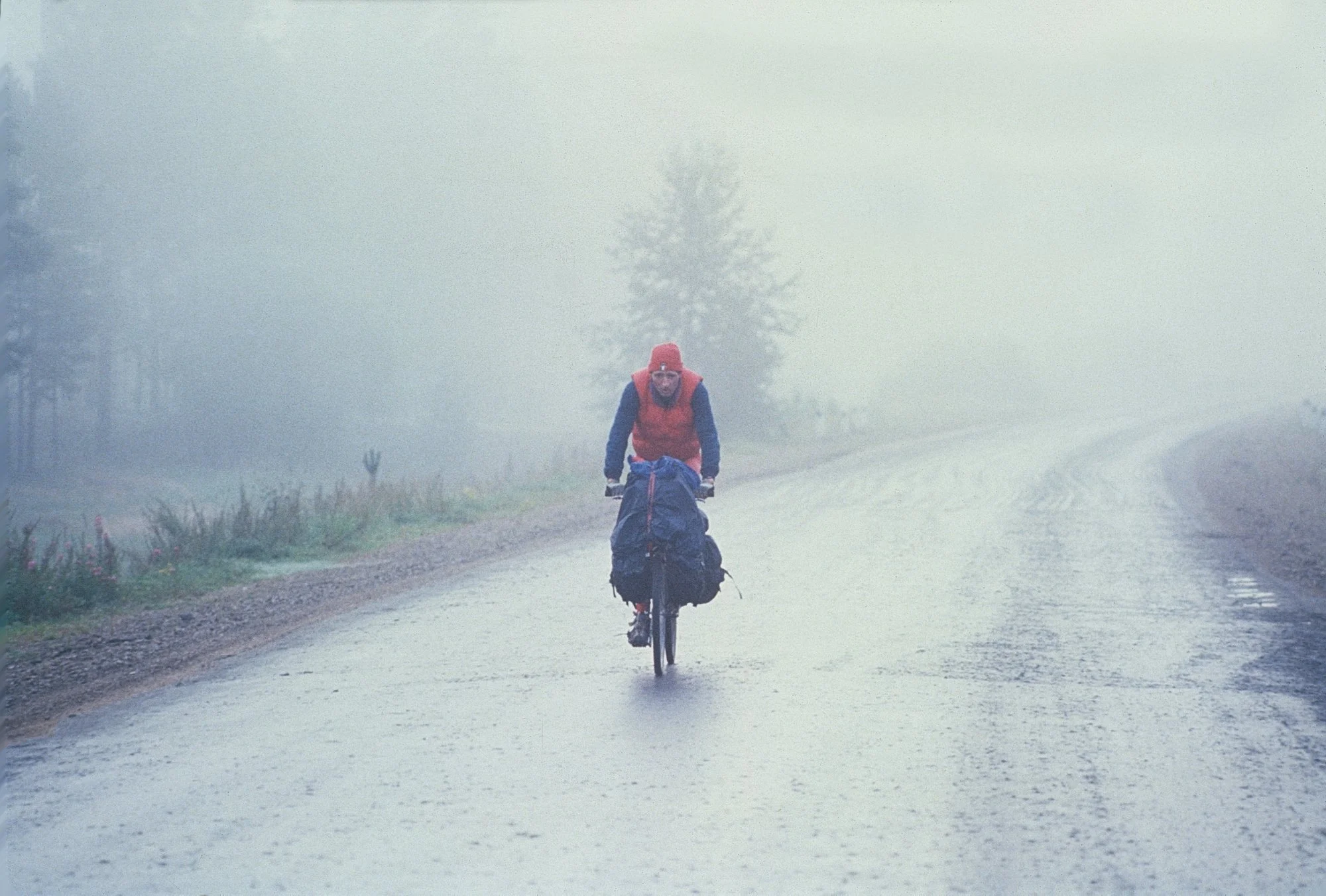 Enjoying an early taste of Siberian weather, but back on paved road and a new wheel sent from Moscow, where we had left an entire spare bike.