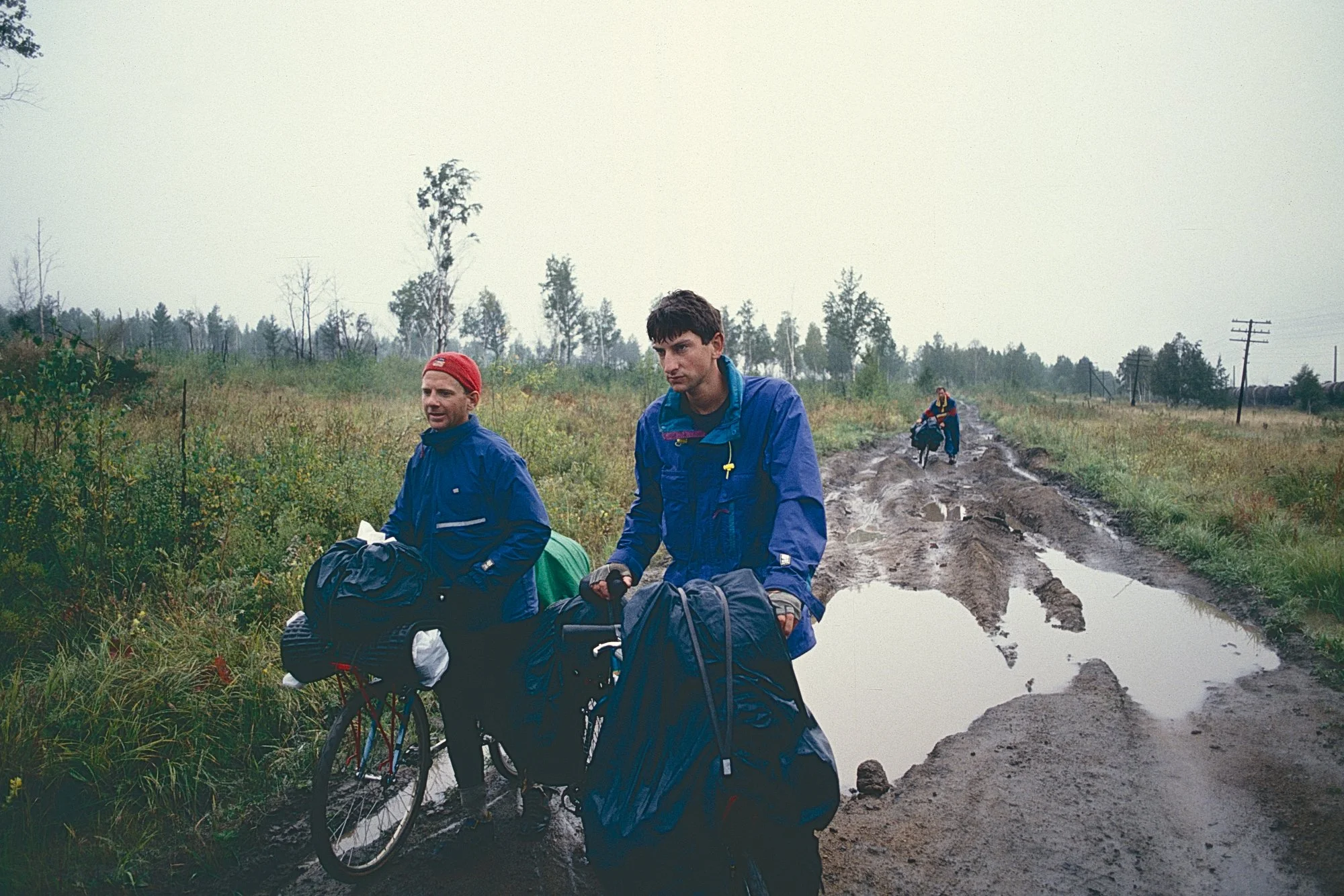Still on slick: since we're mostly pushing our bikes, we decide to save our one set of knobby tires for what we hope will be a muddy but more rideable section on the eastern side of the swamp. 