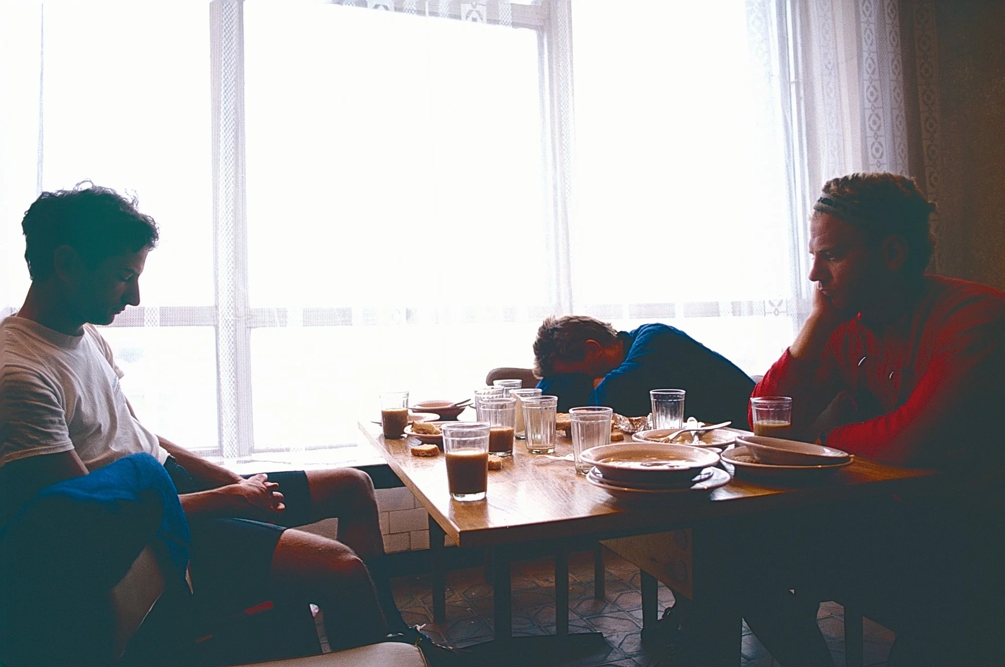 The mood after a depressingly Stolovaya meal during a brutal day of rain and headwind in the Russian plains.