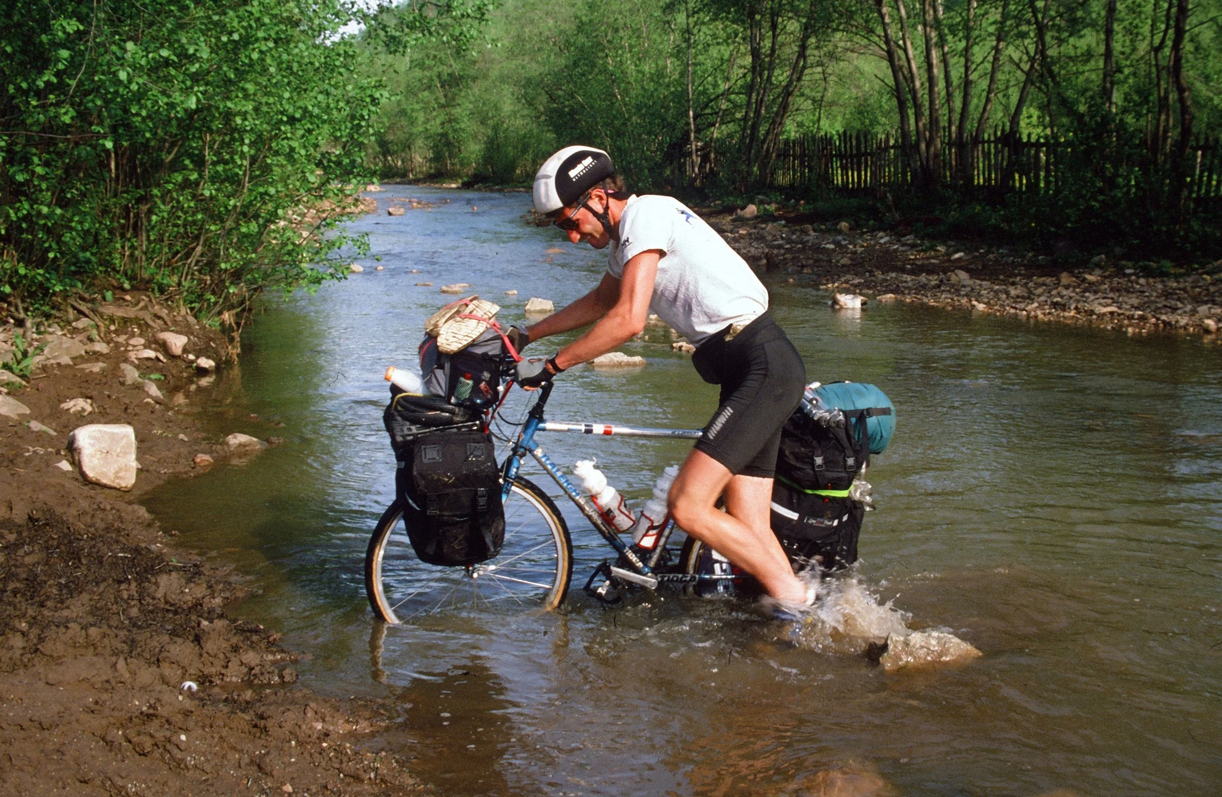 Tucked in T-shirt, check. Fanny pack, check. Effort overbite, check. 