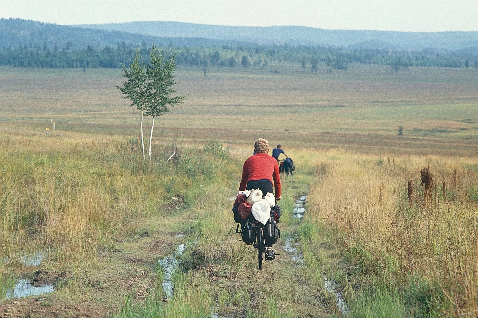 On elevated and partially drained sections, tracks made by off road track vehicles are sometimes rideable.
