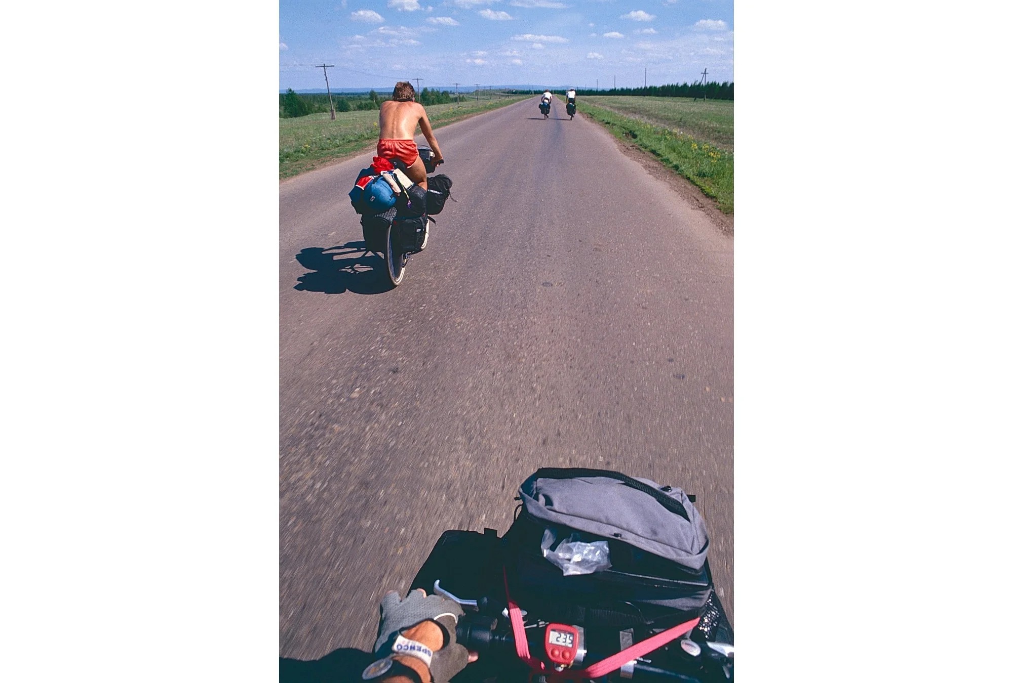 The view from the bike: Spring comes in and we try to make good time in the Russian plains, cycling 8-10 hours a day.