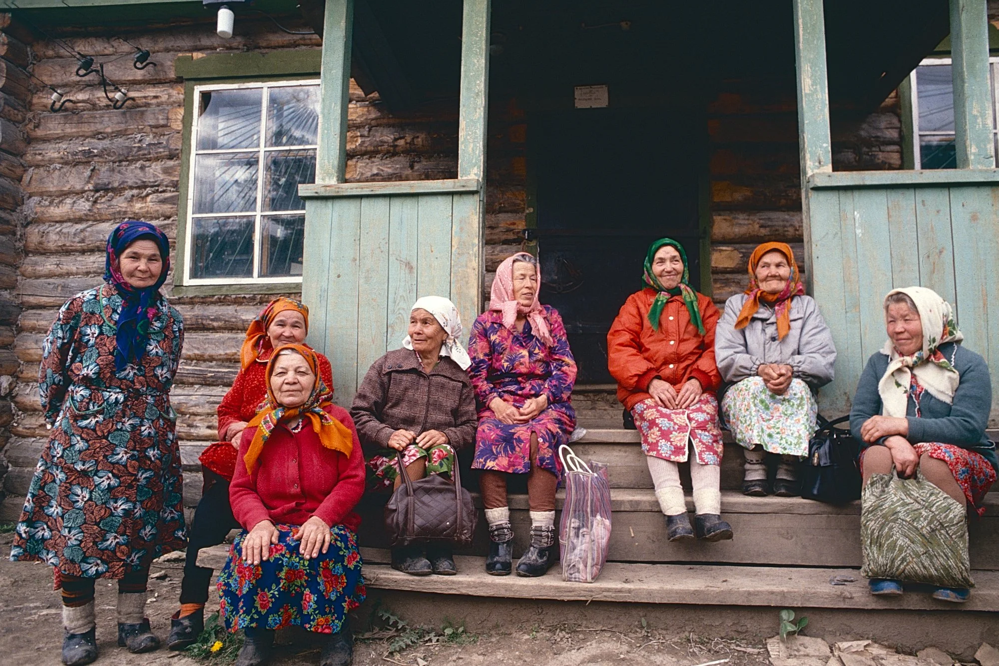 Babushkas wait for the store to open in a Ural Mountains village.