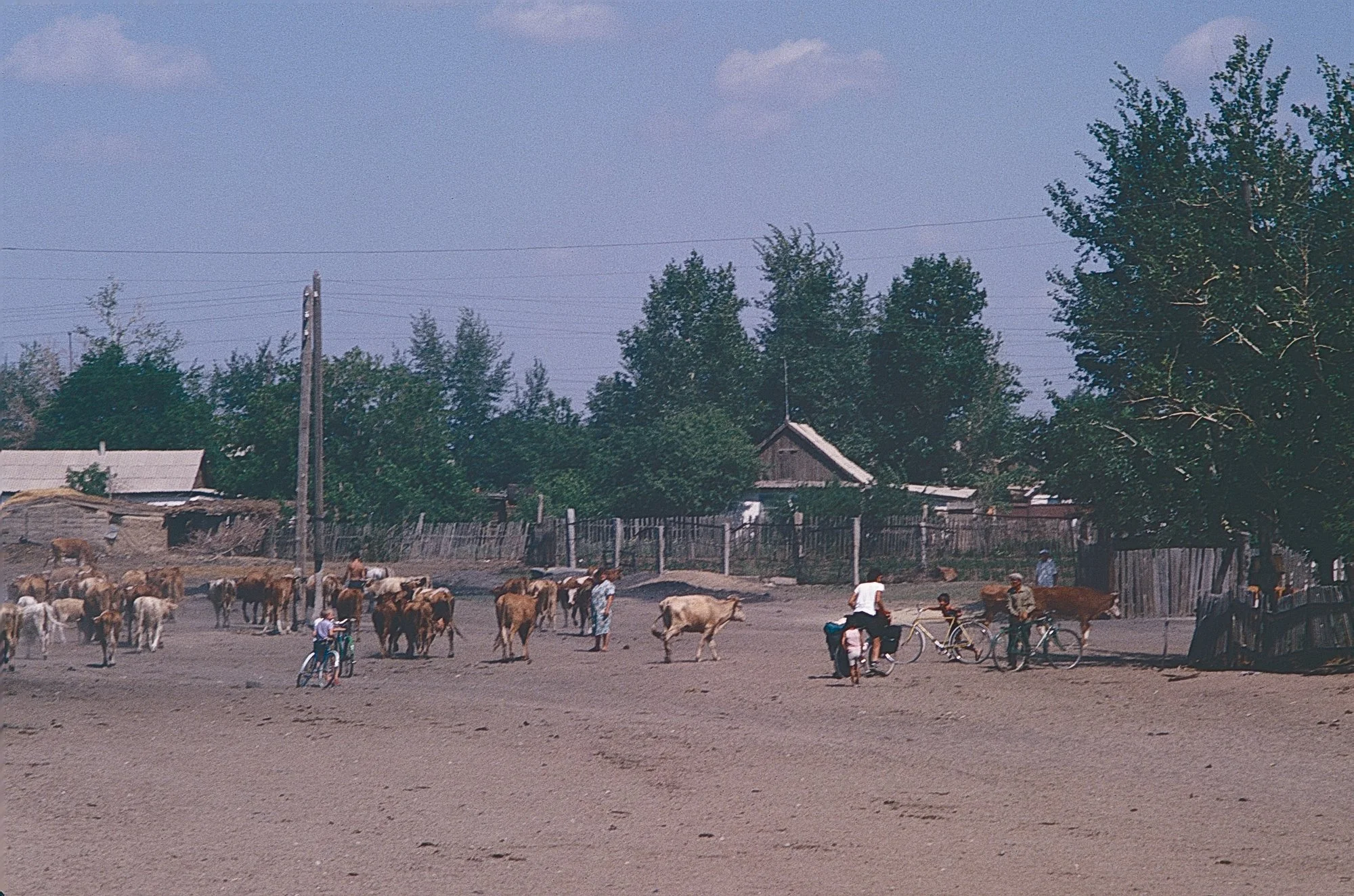 Simon asks fellow cyclists for direction.