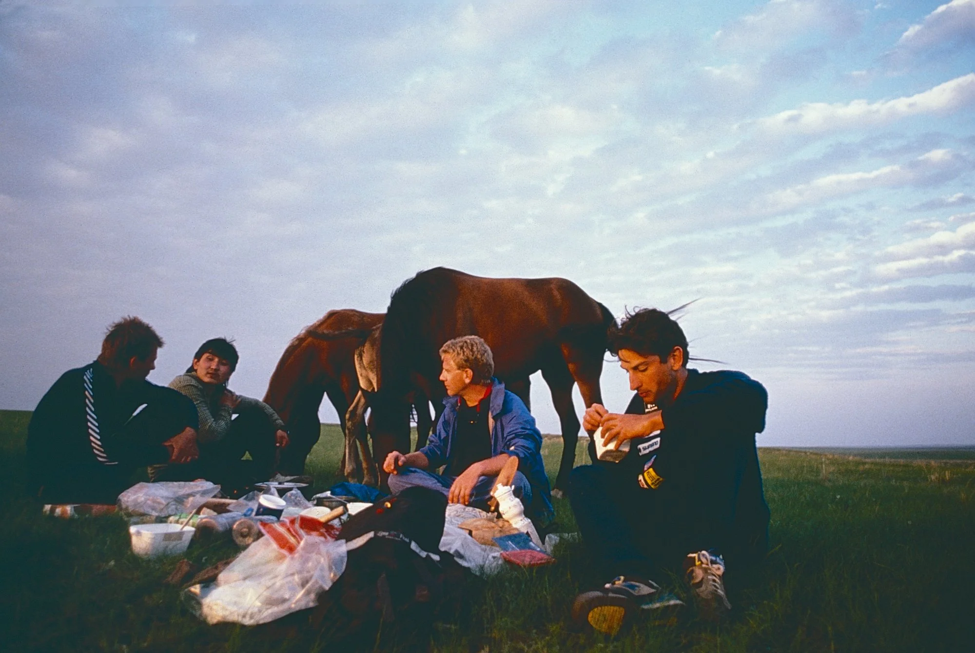 Our first evening in Kazakhstan, we are greeted by a local horseman who appears from the steppes and brings us fermented mare milk, an acquired taste.
