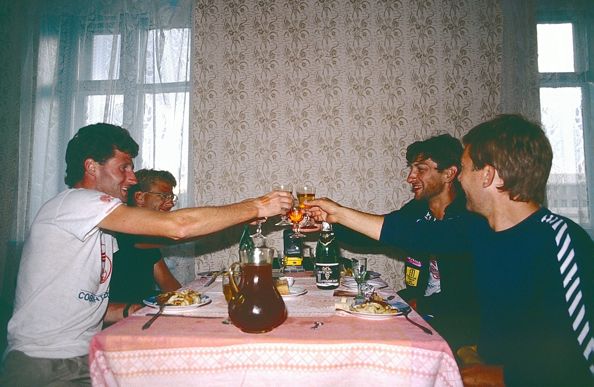 Mood adjustment after a decent meal and a bottle of very sweet Russian champagne. In the lead for best cycling gloves tan lines.