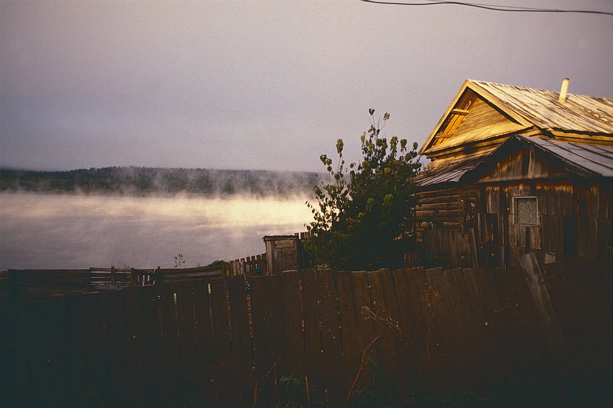 Frosty morning on the bank of the Amur River. Through the lifting fog, China is visible across the water. After stumbling on a short but miraculous dirt road in the dark, we excitedly followed it to a dilapidated military base, where we spent the nig