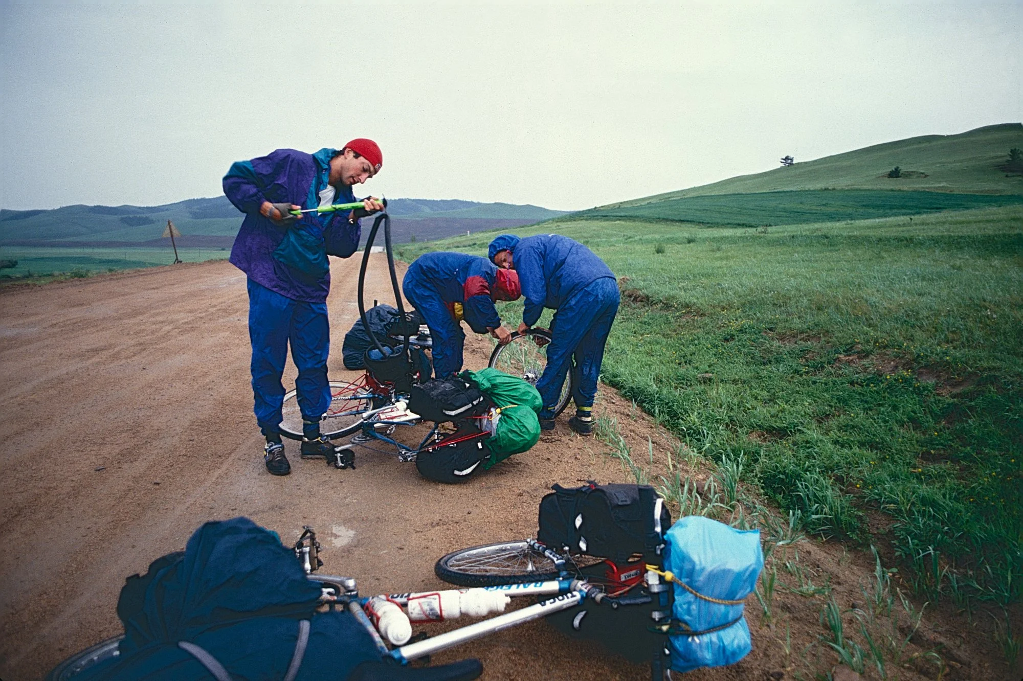 Under the weight of panniers overloaded with spare parts, food and winter gear, the wet and sandy dirt grinds our sidewall like sandpaper, shredding tires and causing punctures. We go through an alarming amount of tires and tubes. Chains and deraille