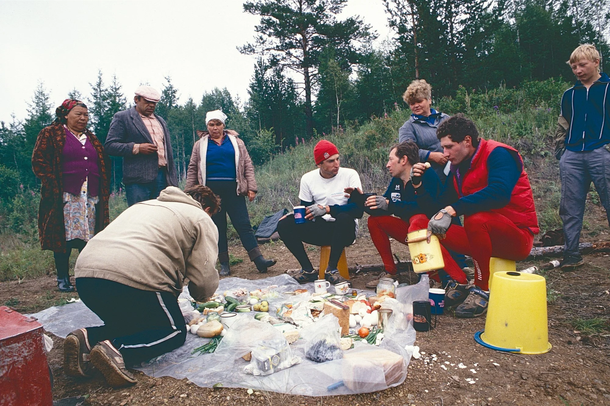 Mushroom pickers share their lunch with us. 