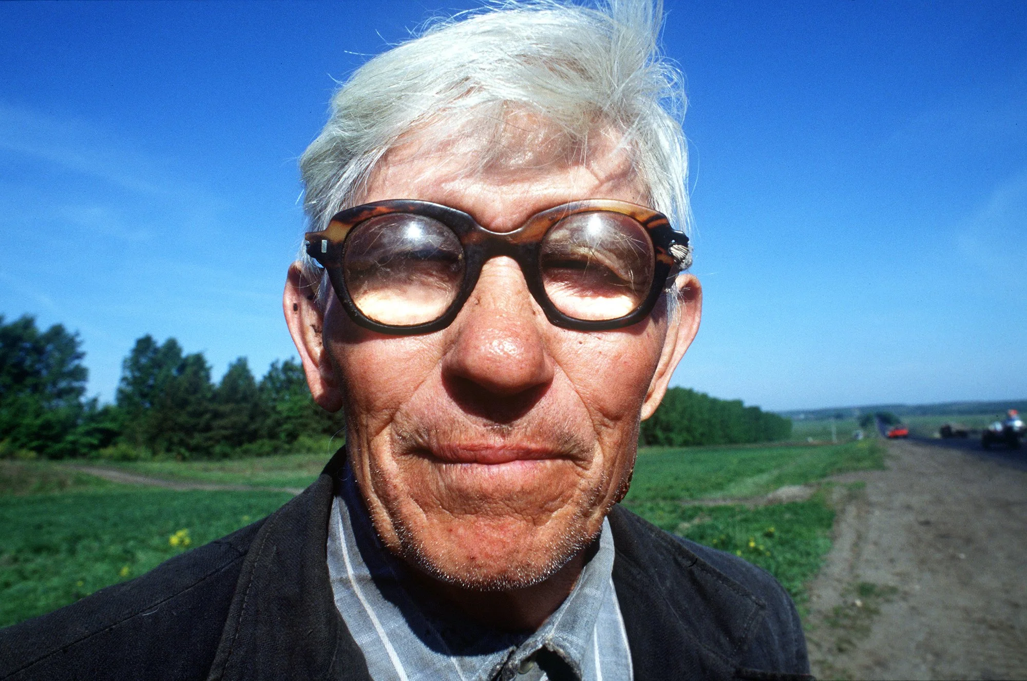 A Russian farmer waived at us as we rode by, and we circled back. Alexander  was 80, and he had never met a foreigner. After meeting an American, a British and a French cyclist, he said "You're just like us!". 