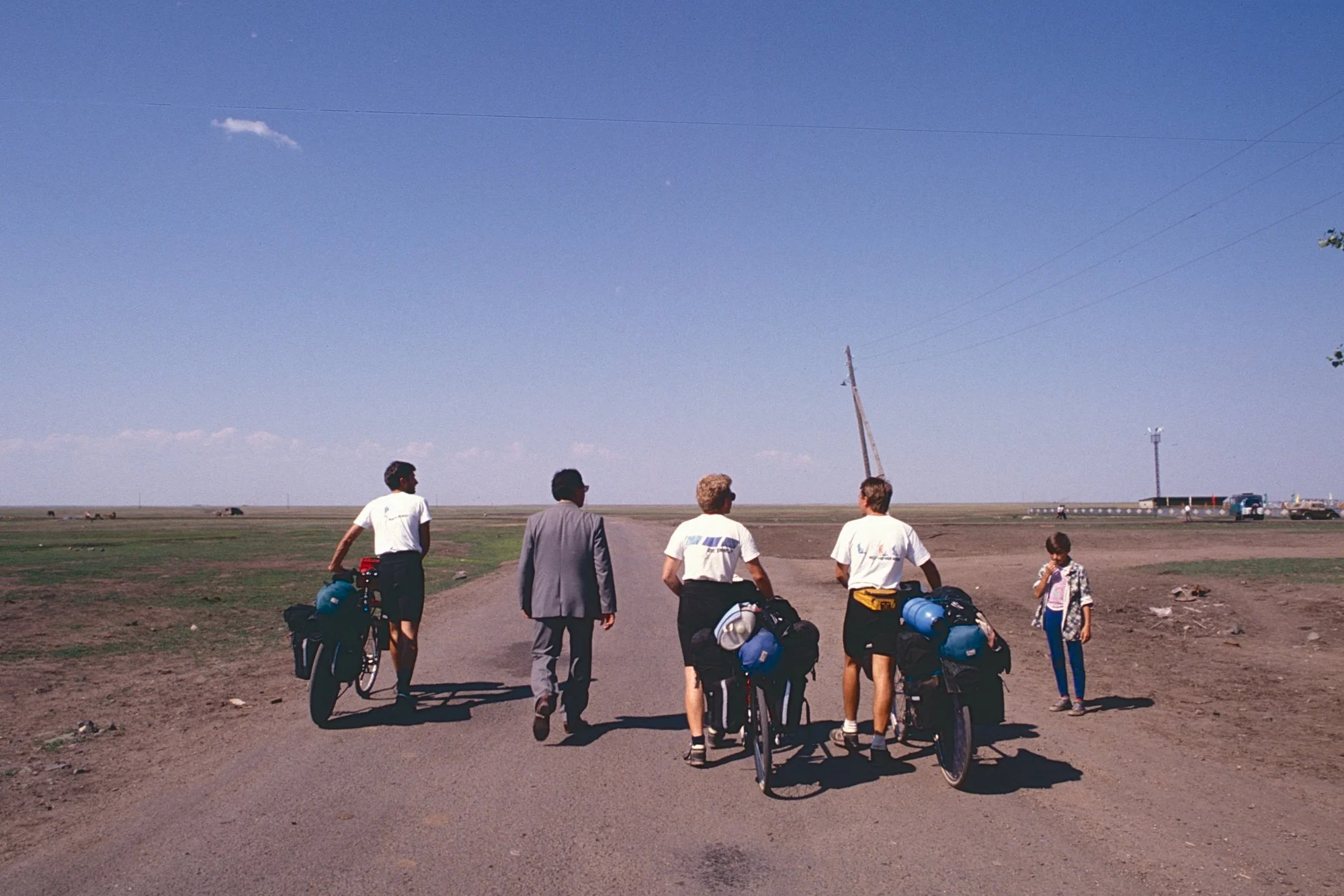 As we are about to leave Kazakhstan, the chief of the local Communist Party invite us to the grand opening of a stadium as guests of honor.