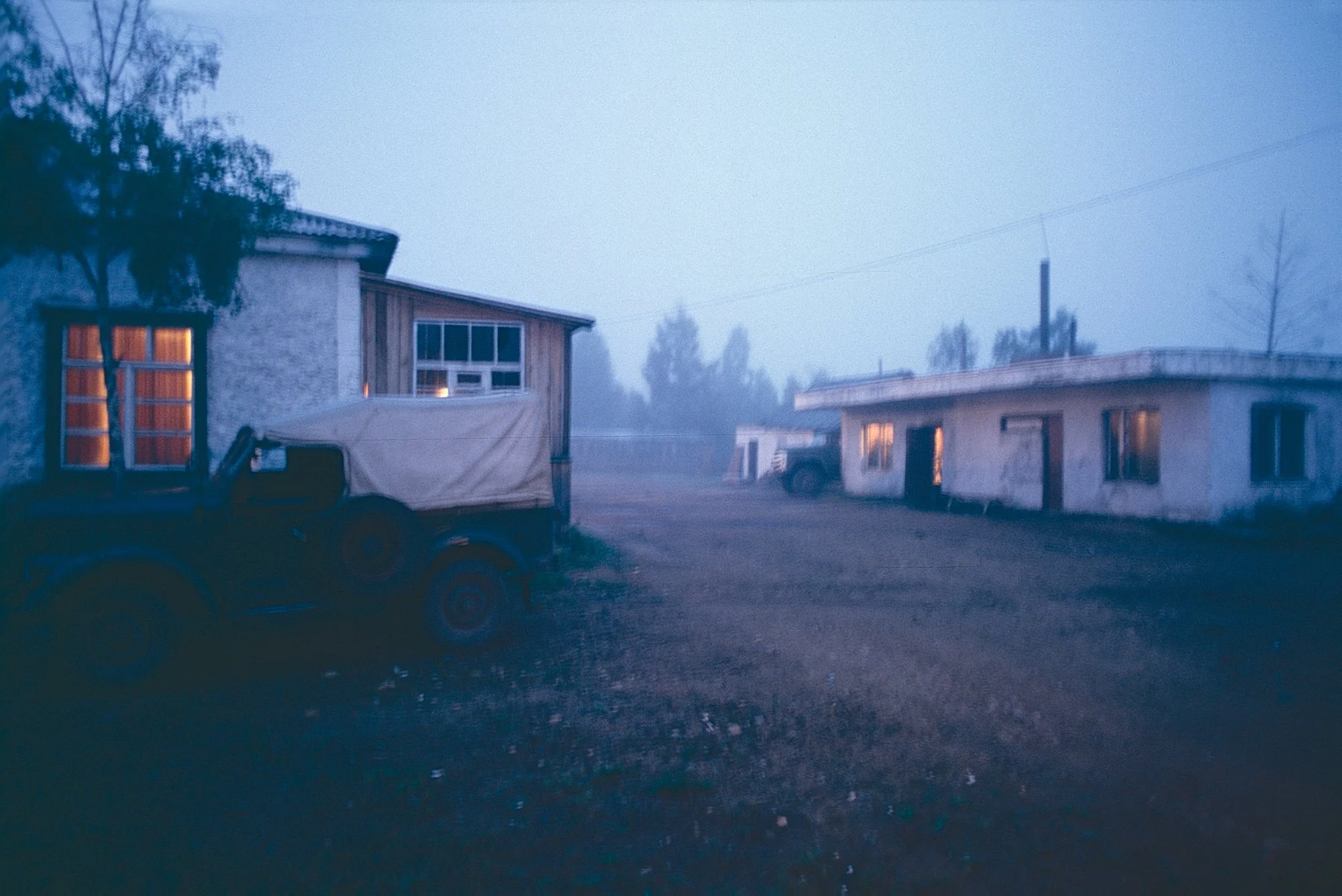 Morning fog at the gold mine. Mine workers, mostly adventure seeking fellows from far flung Soviet republics, work for six month straight without days off, but enjoy perks like fresh vegetable from a greenhouse, a gym, decent meals, and salaries many