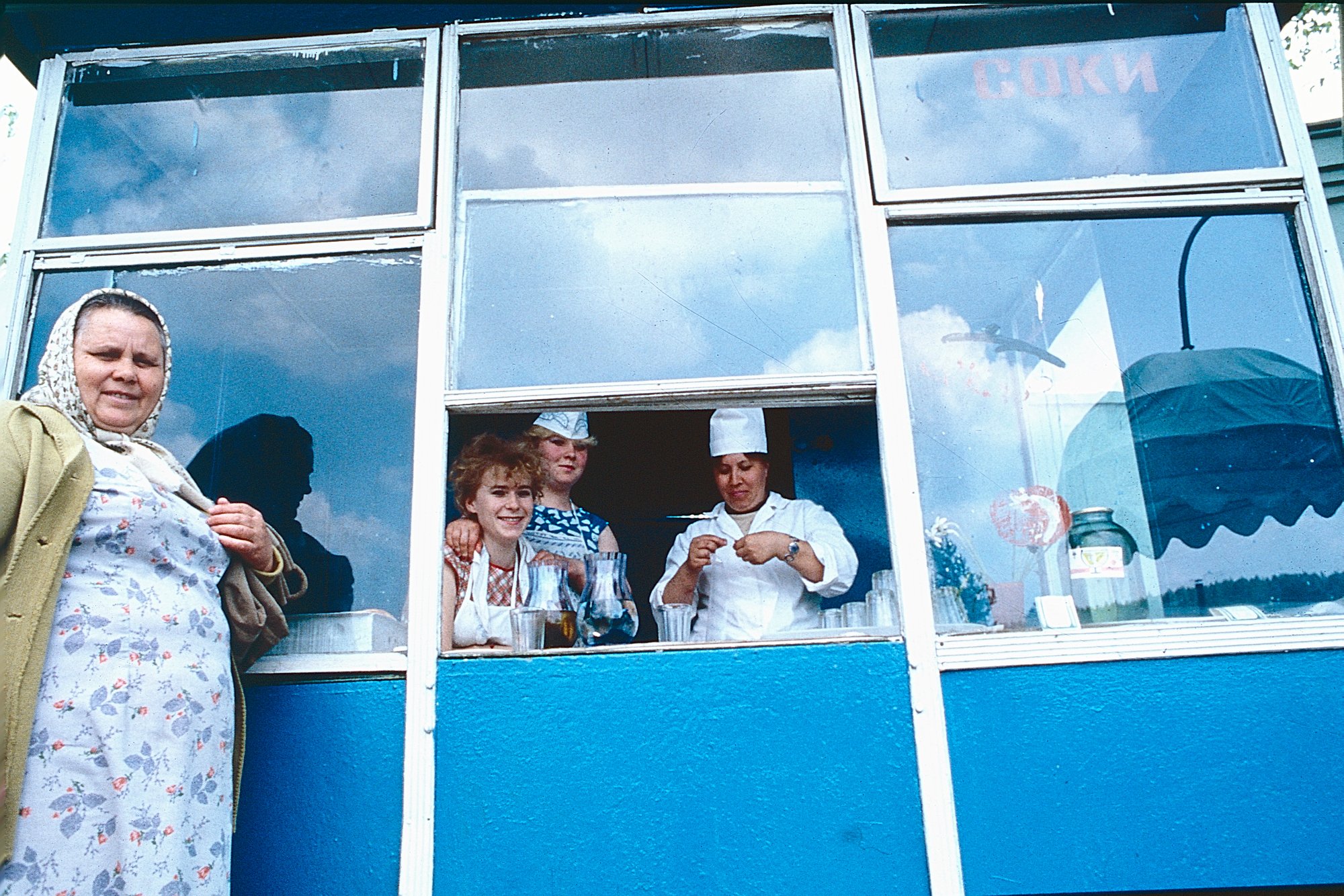Hanging with the ladies at a fruit juice stand.