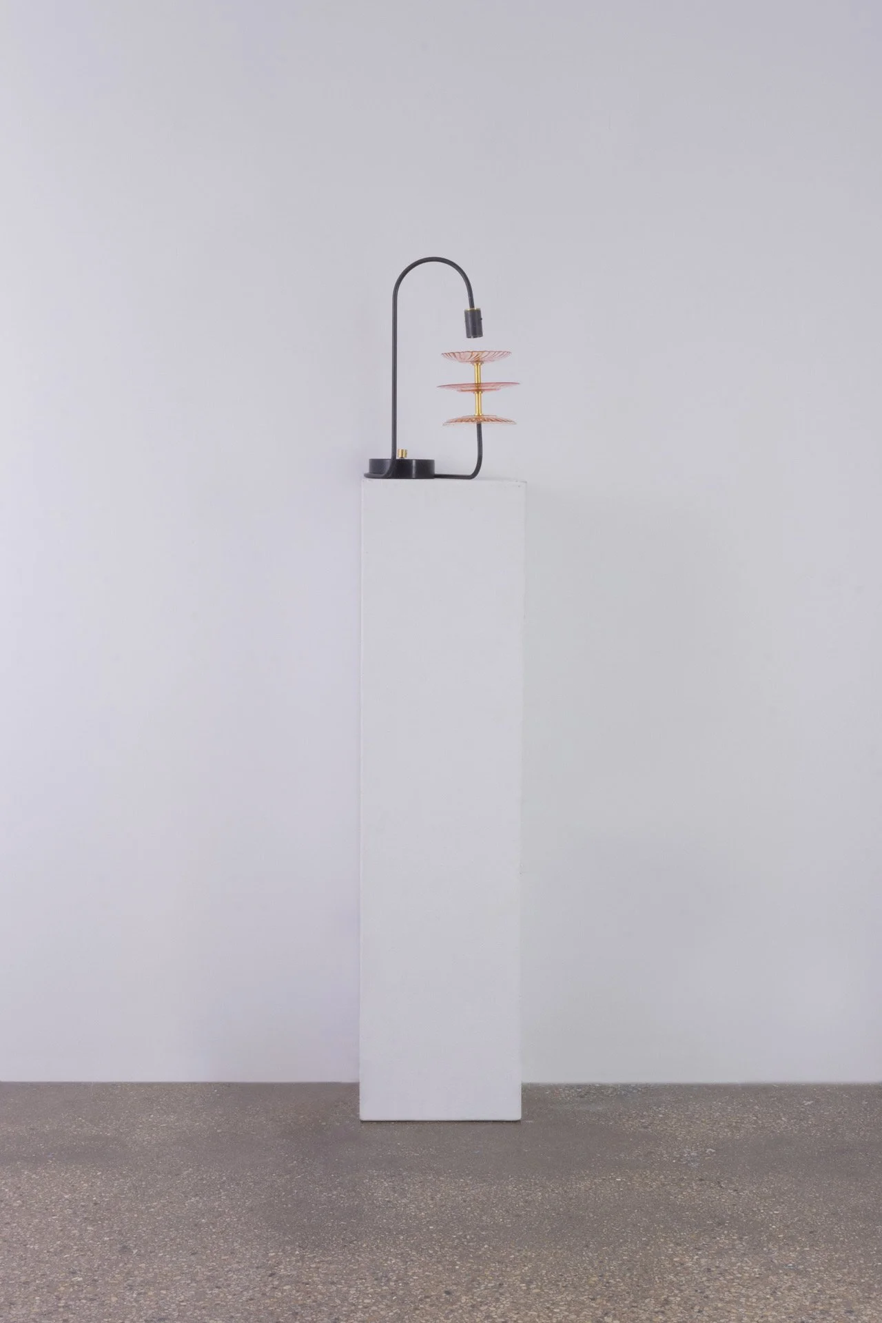 Unilluminated, wider view of the lamp.