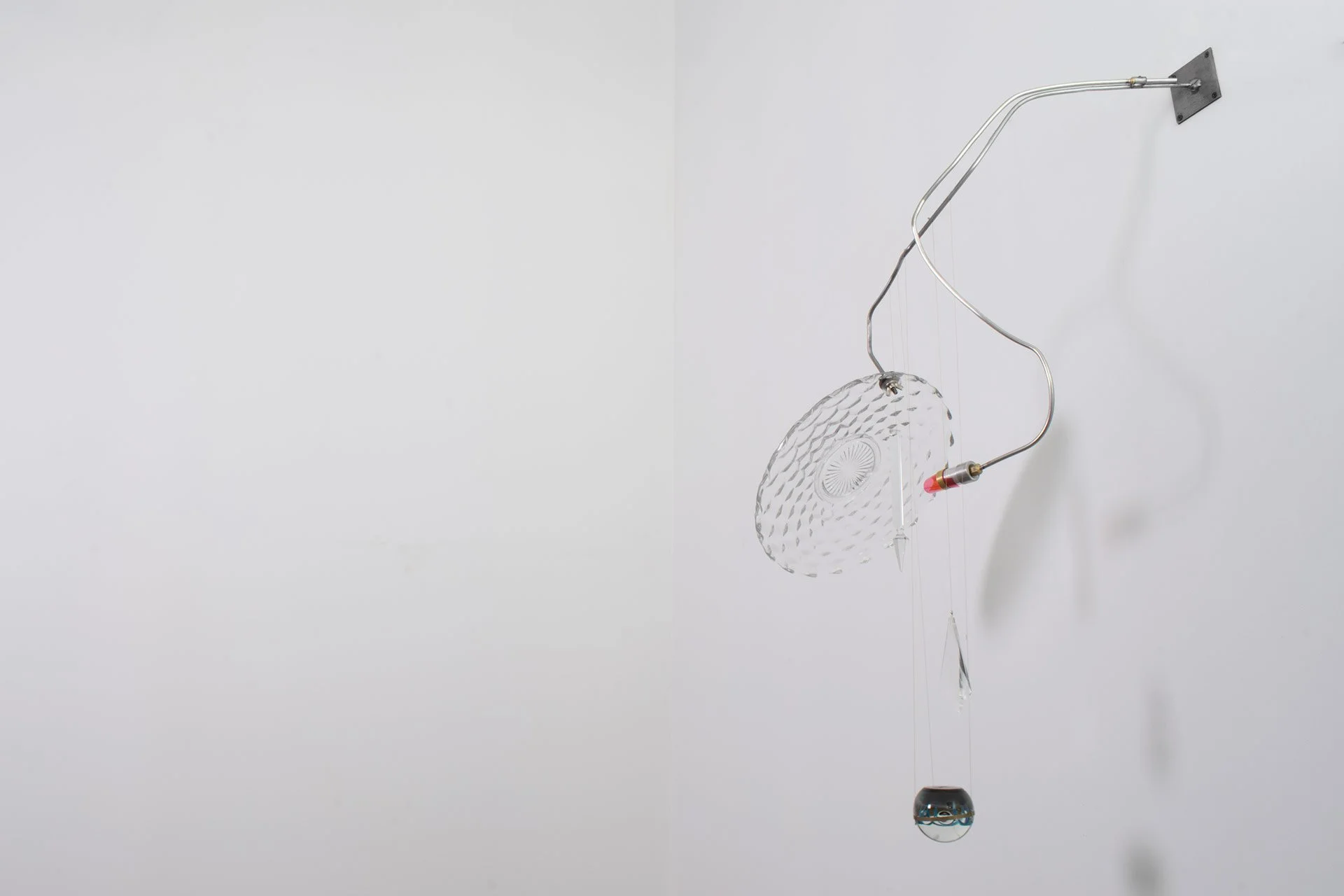 Unilluminated, wider view of the fixture.