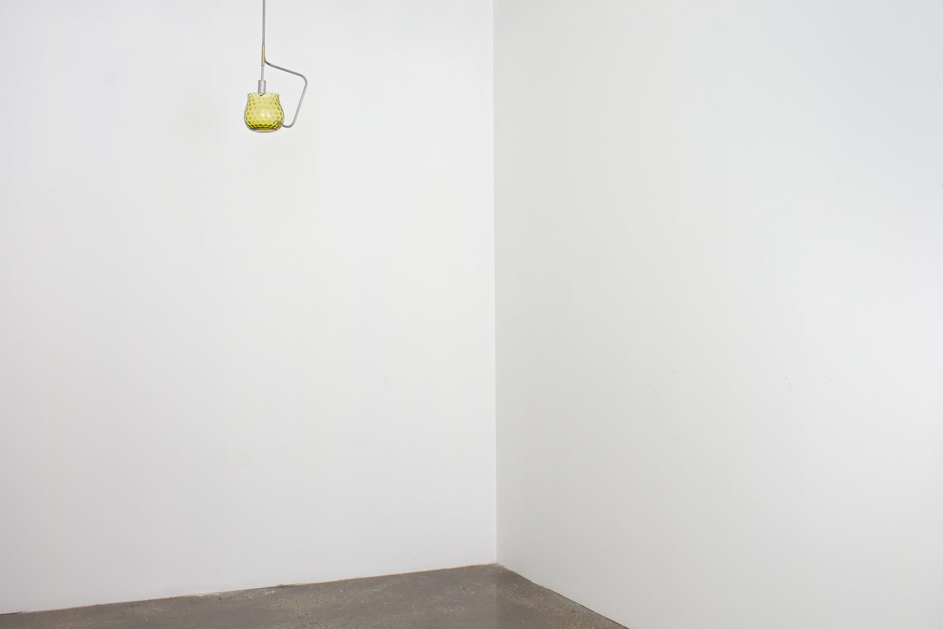Unilluminated, wider view of the fixture.