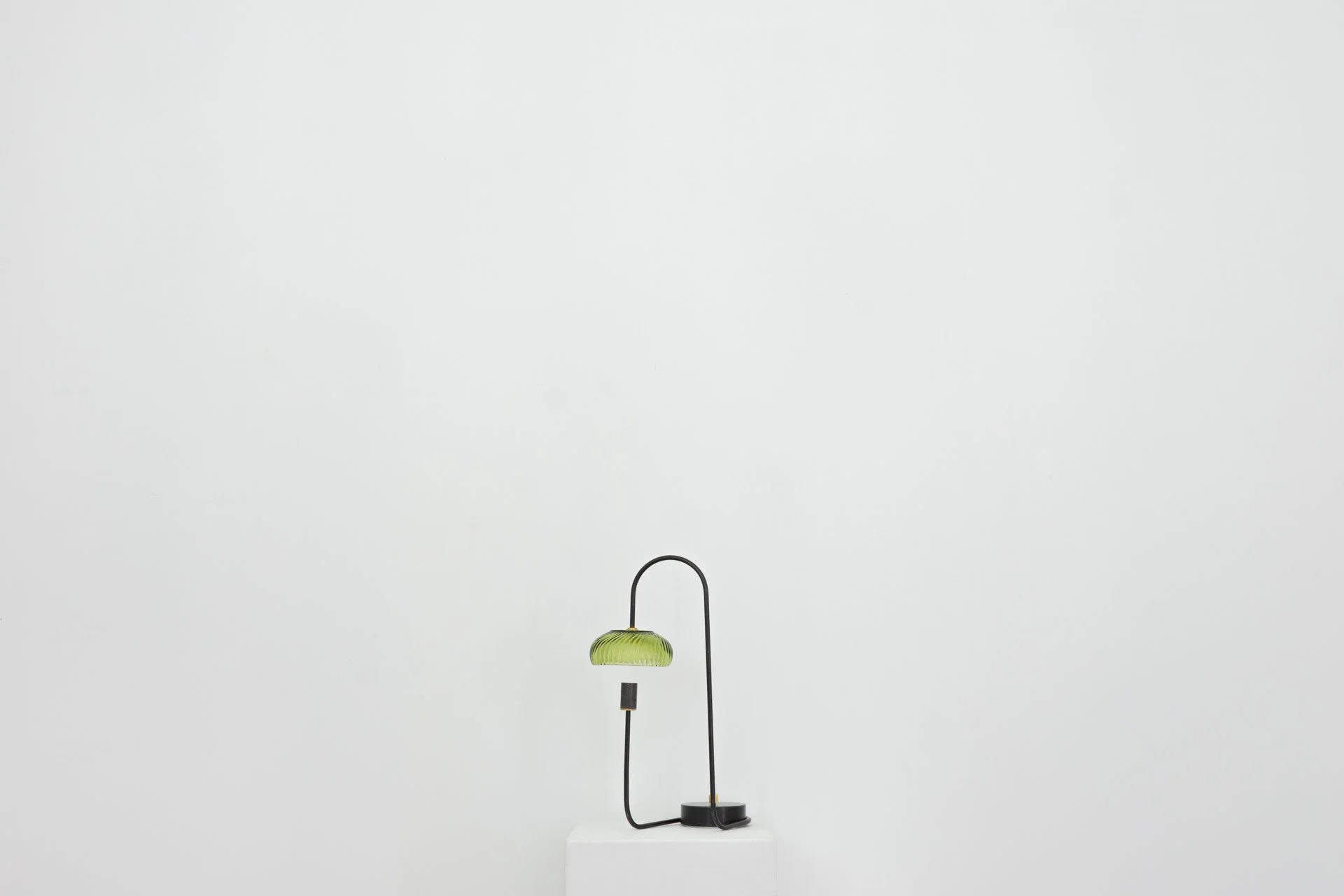 Unilluminated, the green ribbed bowl is emphasized.