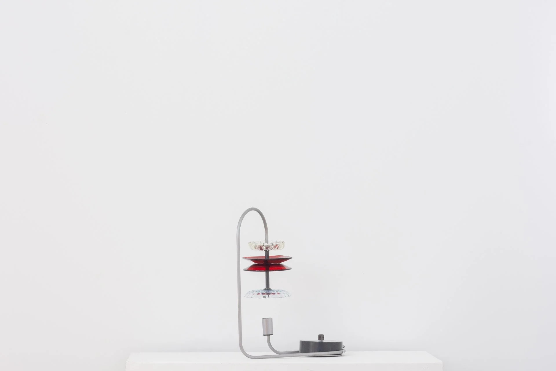 Unilluminated, wider view of the lamp.