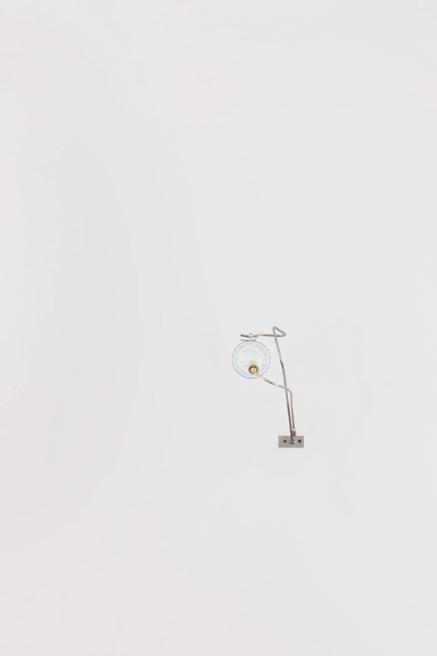 Unilluminated, wider view of the fixture.