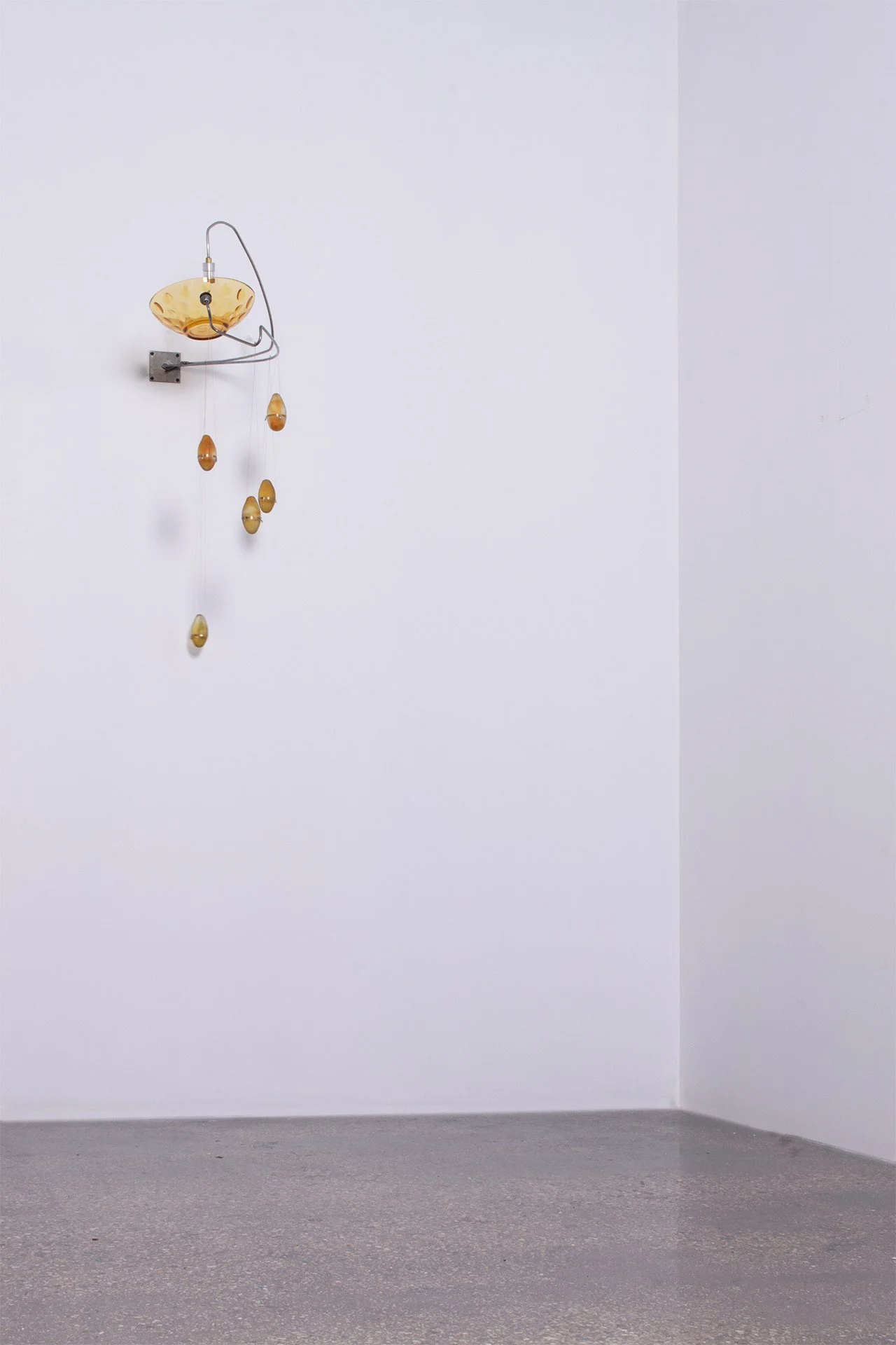 Unilluminated, wider view of the fixture.