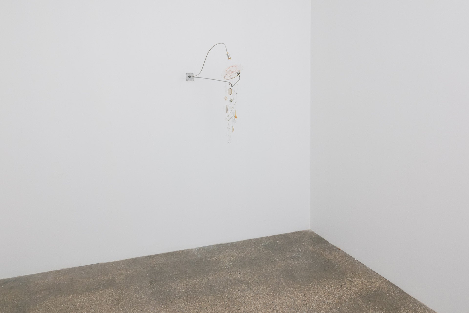 Unilluminated, wider view of the fixture.