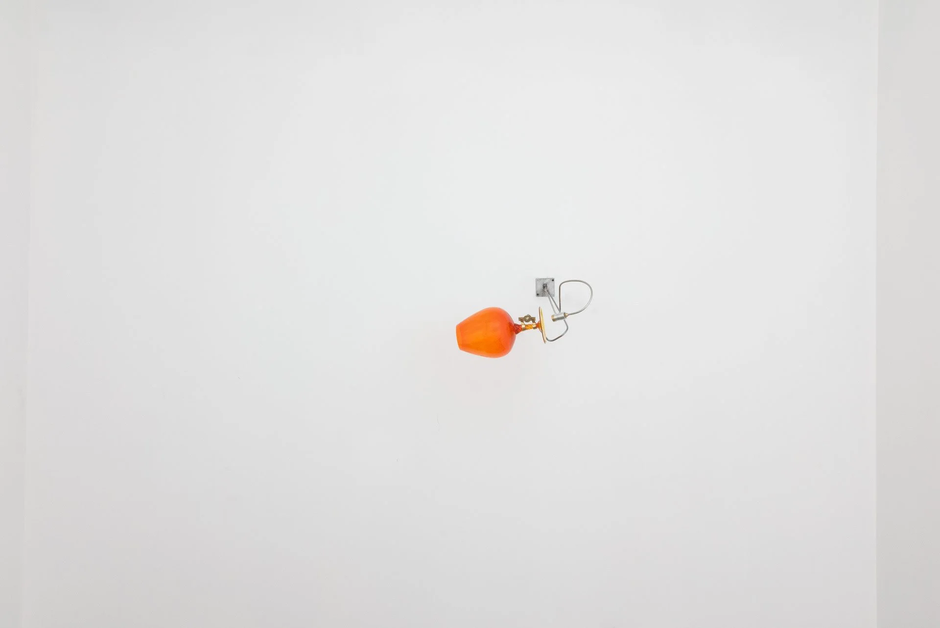 Unilluminated, wider view of the fixture.