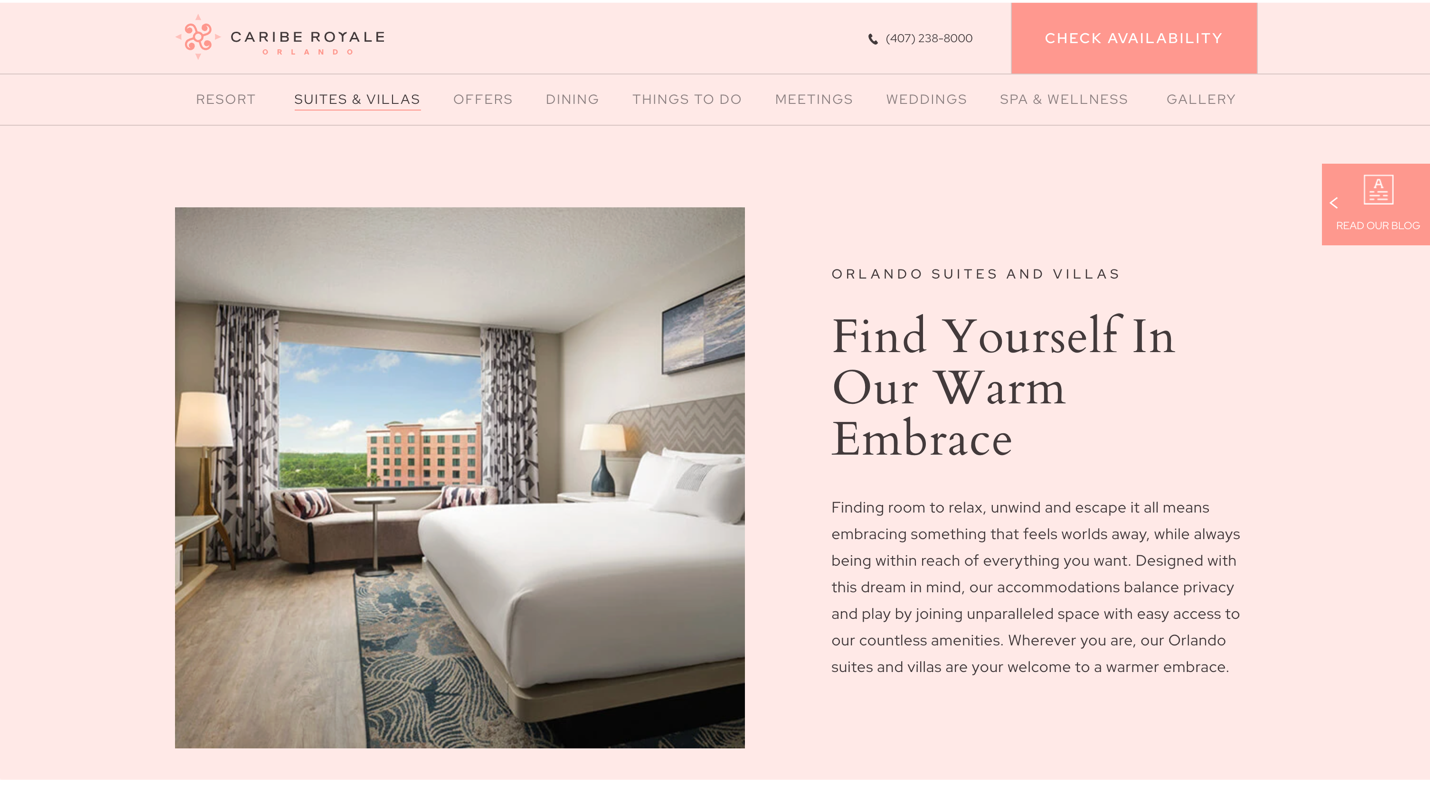 A screen capture of Caribe Royale's Suites & Villa's subpage depicting a hotel room with a bed, bedside lamps, a window with a view of a building and trees, and a bench with patterned pillows.