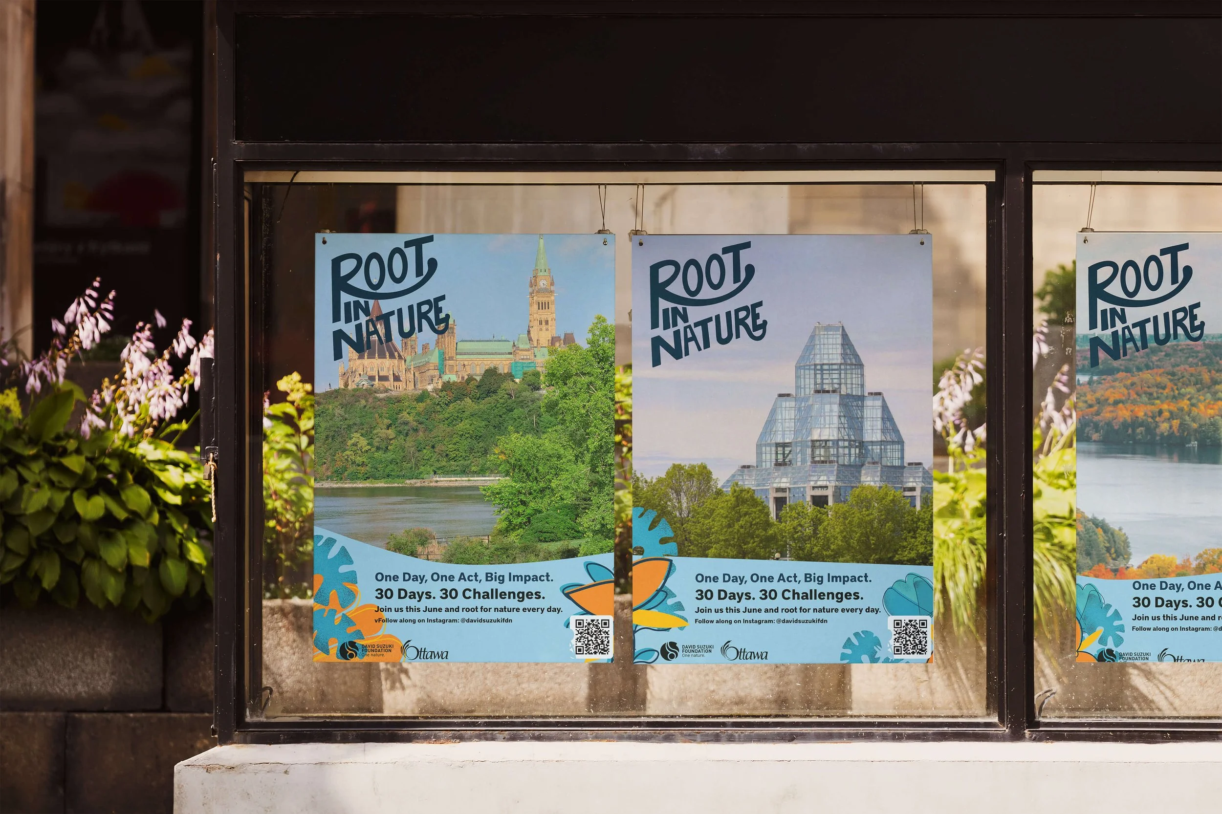 Two posters inside a window display with the slogan 'Root in Nature,' showing images of a castle on a hill and a modern glass building, promoting a 30-day challenge for nature activities in Ottawa.