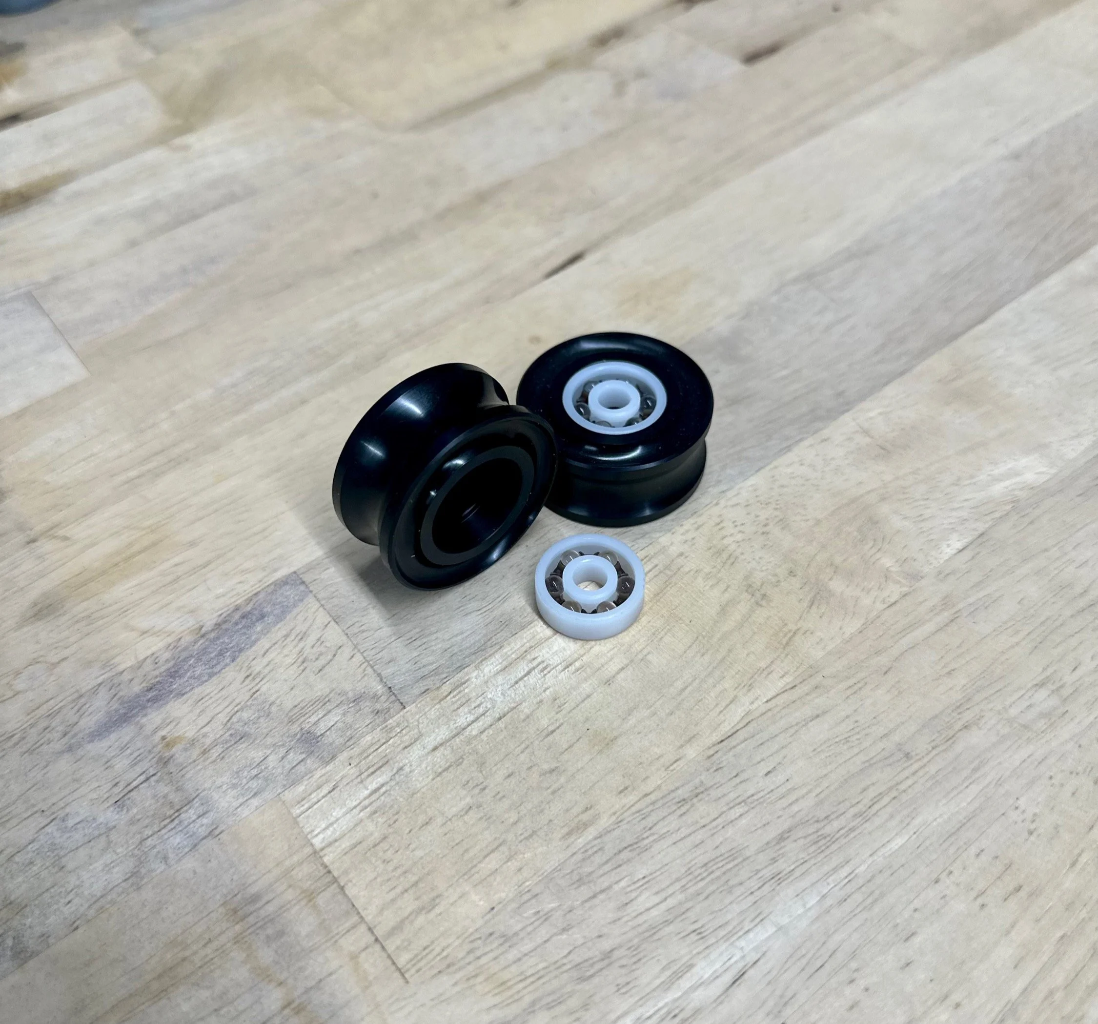Roller wheels with composite bearings | 30mmLx15mmWx6mm axle