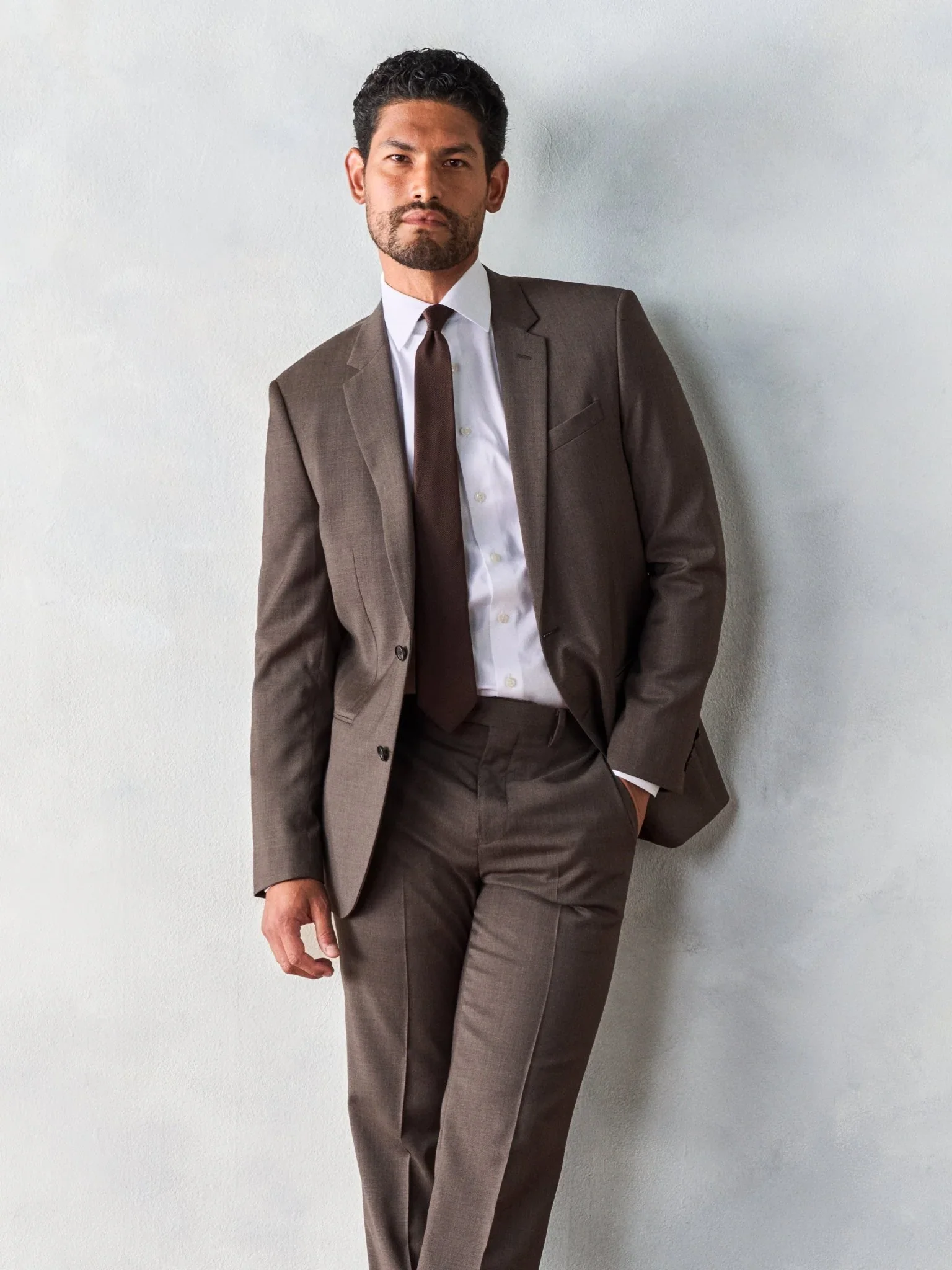 brown-suit-outfit-954417.webp