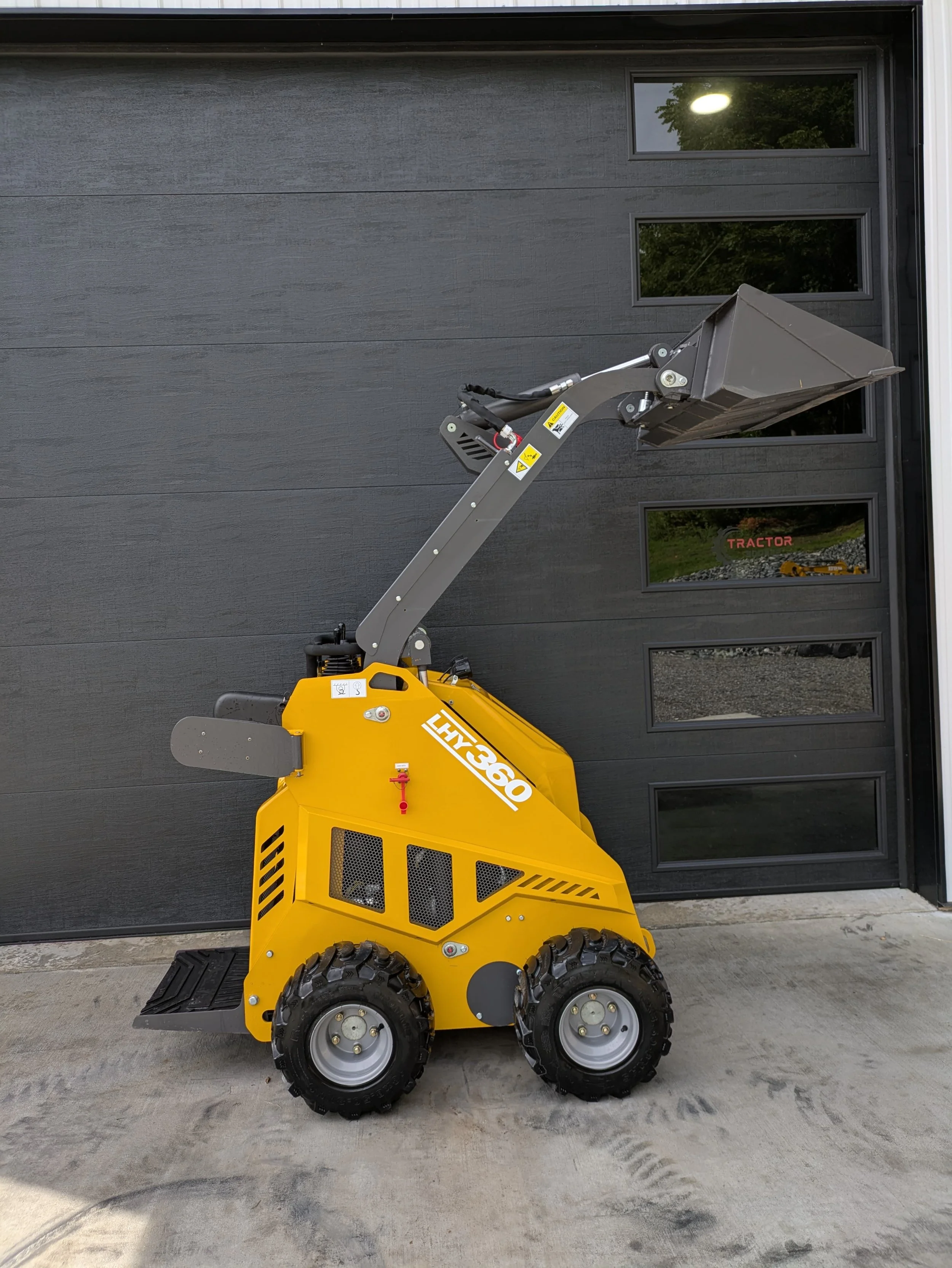 Huayee LHY360 mini skid steer at TractorSource — delivery to Erie, PA