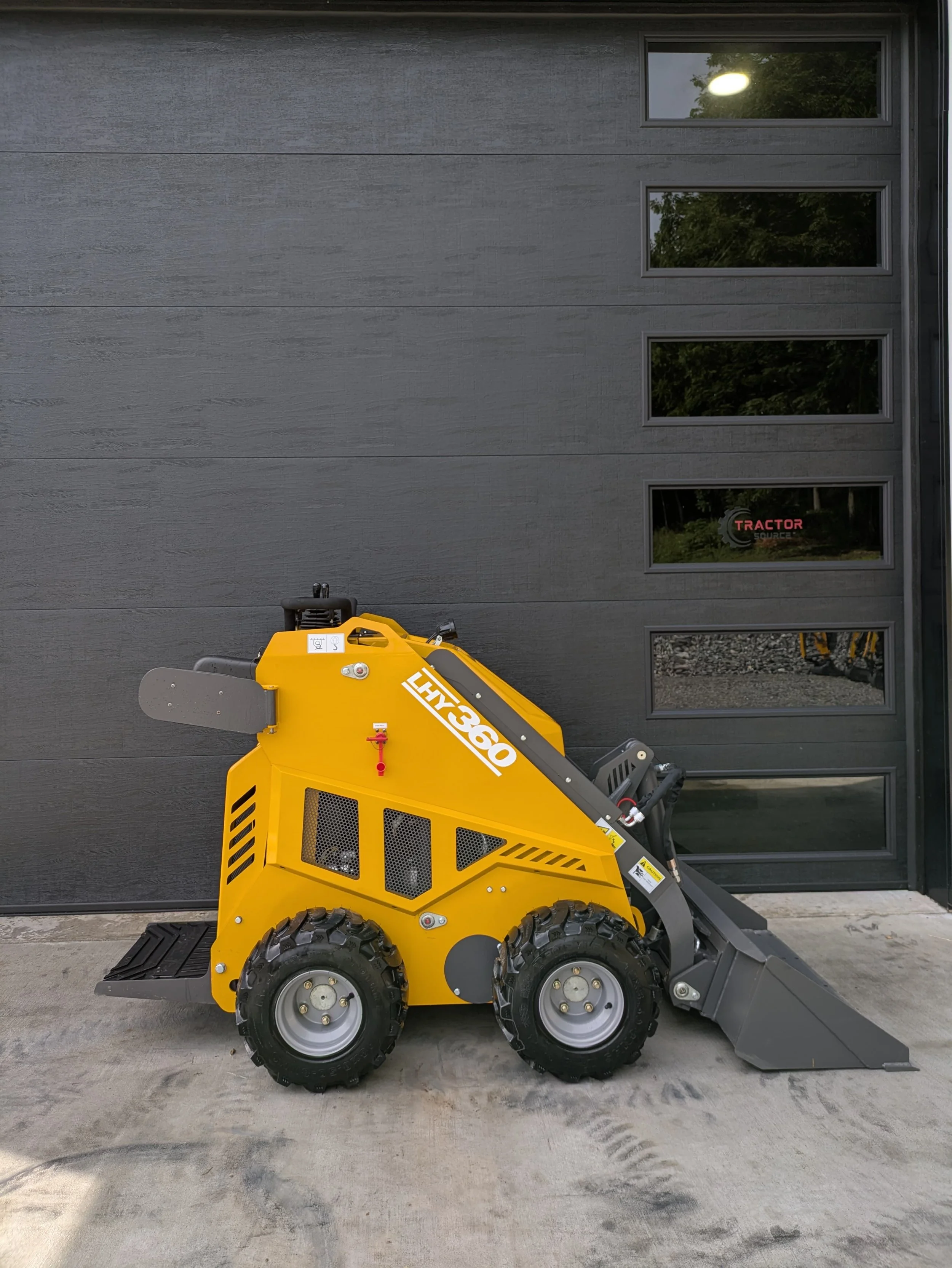 Huayee LHY360 mini skid steer at TractorSource — delivery to Buffalo, NY