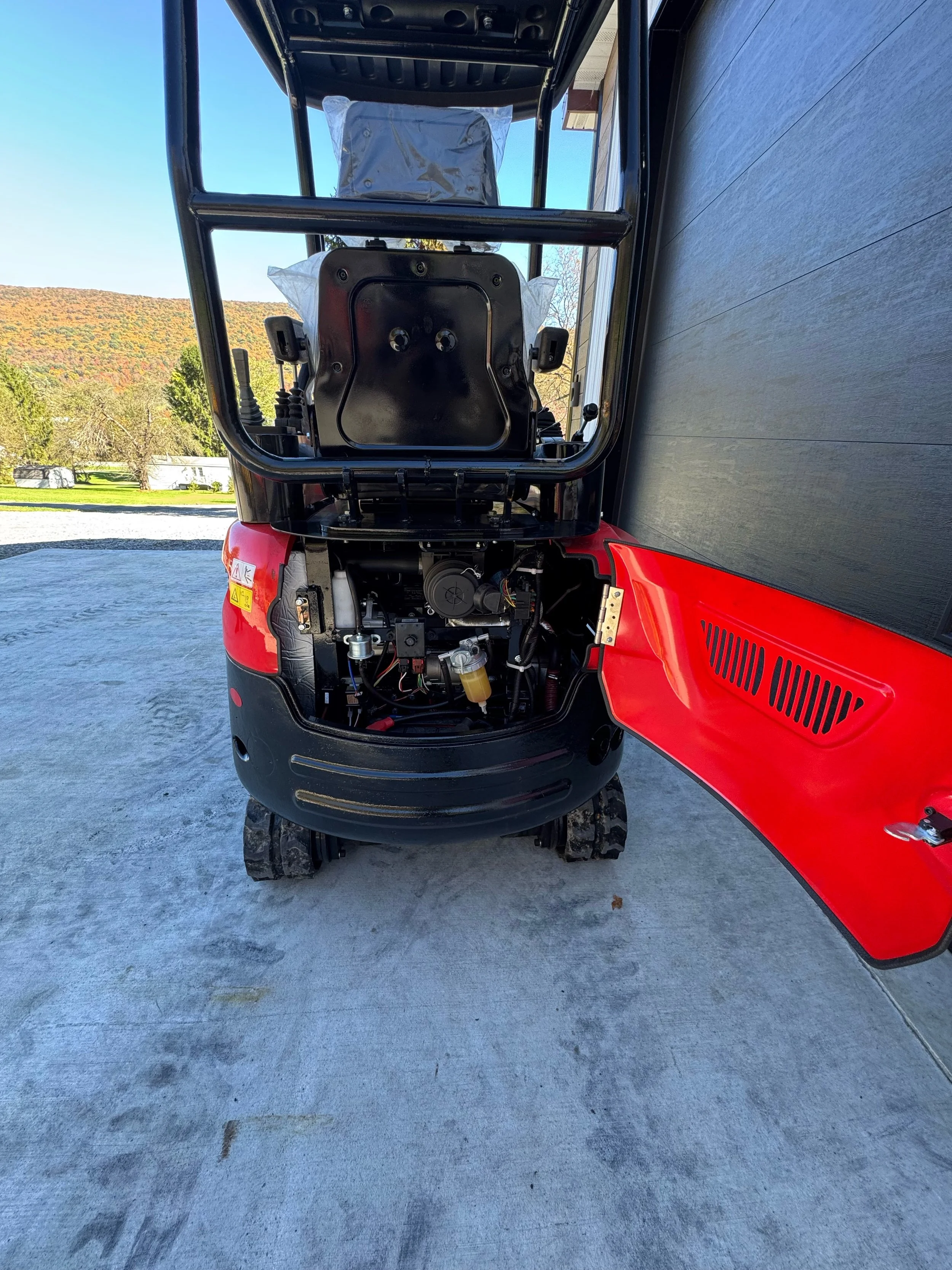 YNT18 mini excavator rear engine compartment open, showing the diesel engine