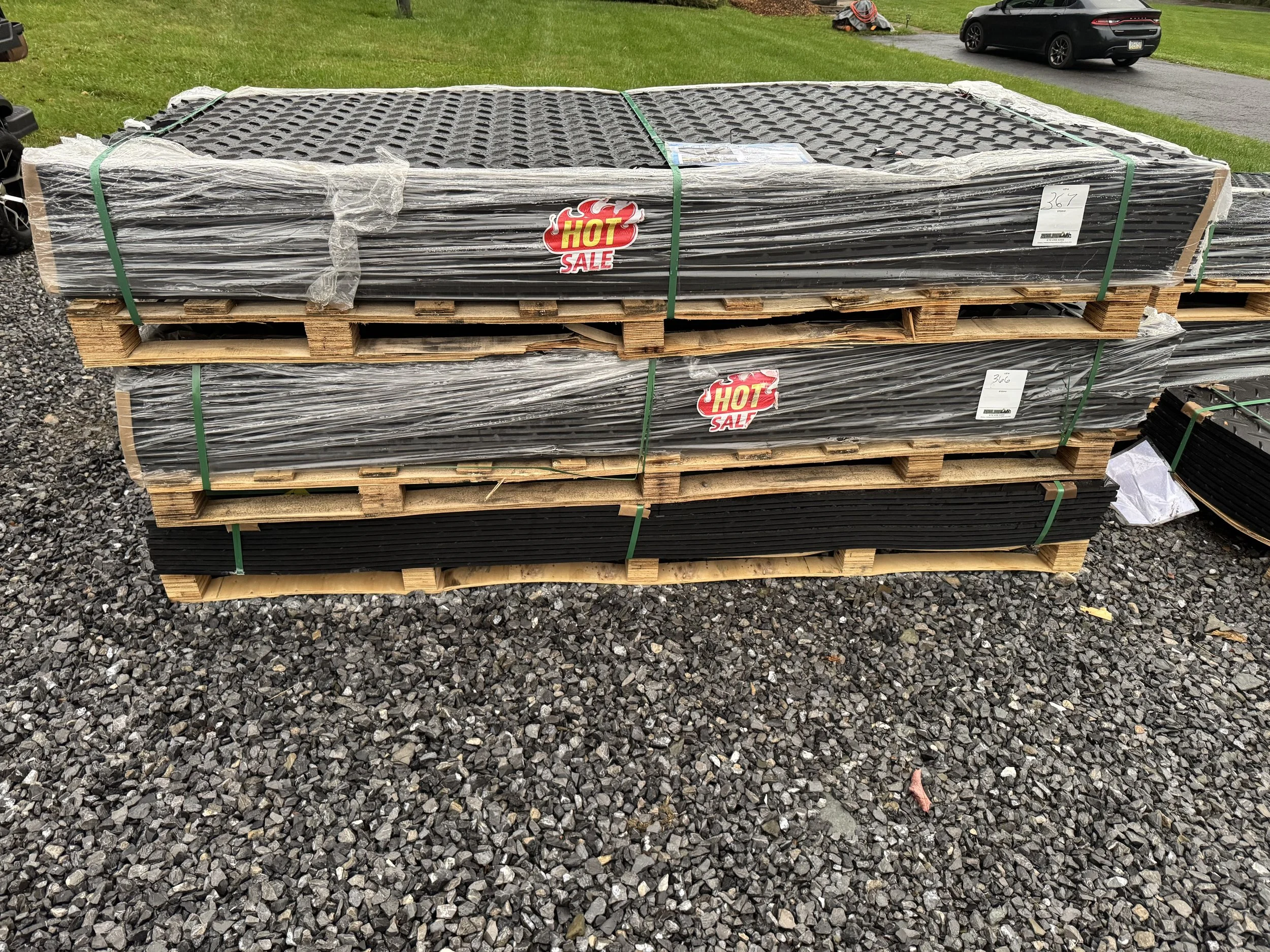 Stacked skids of polyethylene ground protection mats Altoona PA