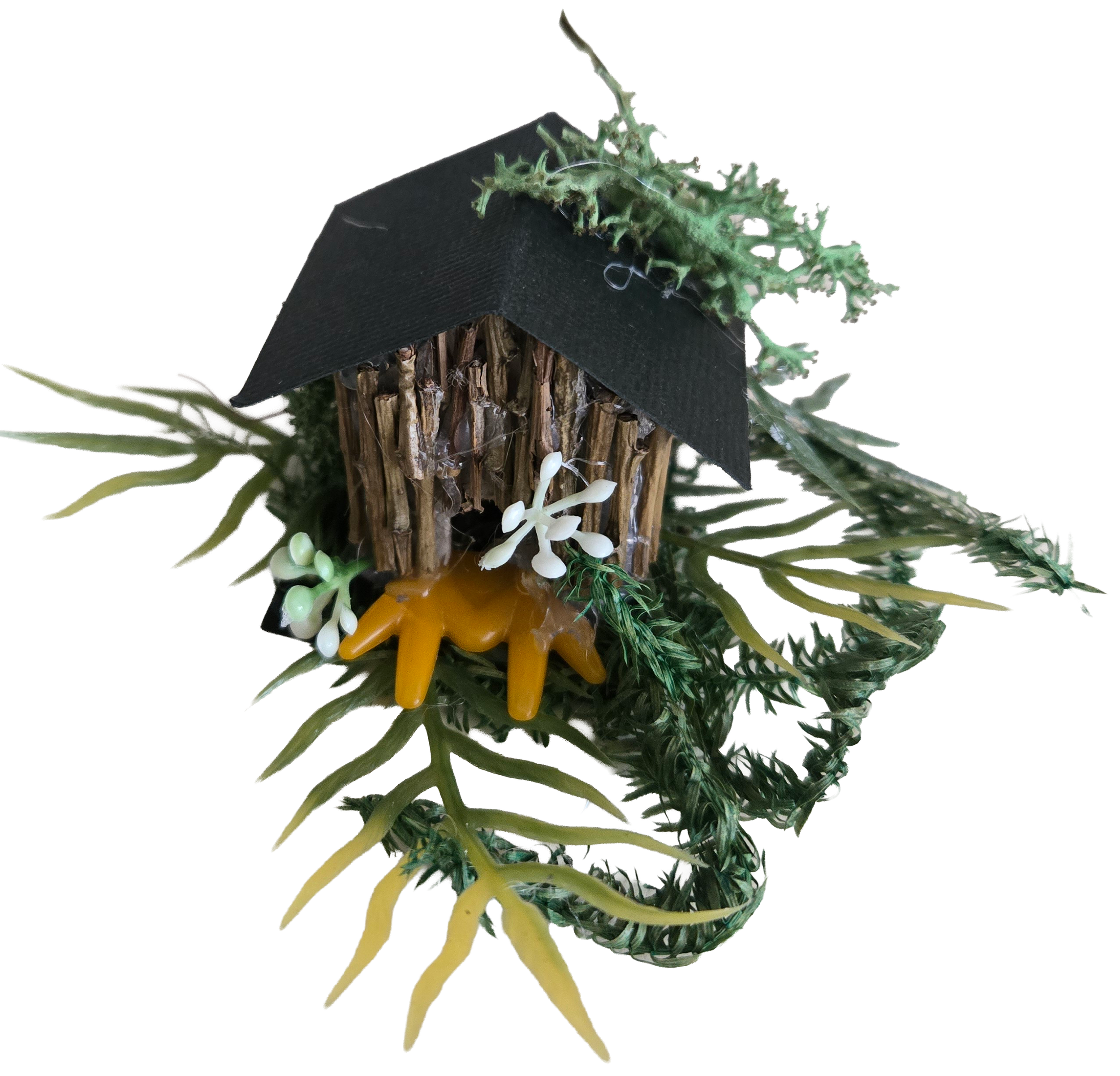 Decorative miniature birdhouse with faux greenery and small white flowers