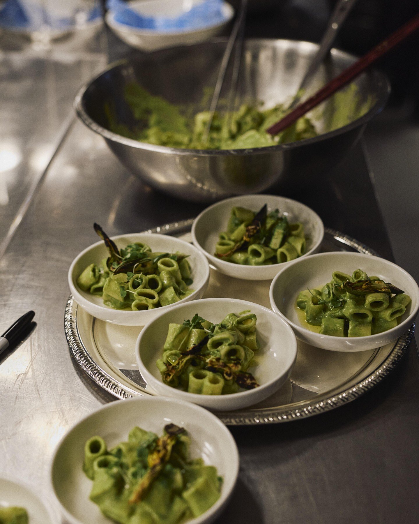 Plating and preparation: where many hands make light work.