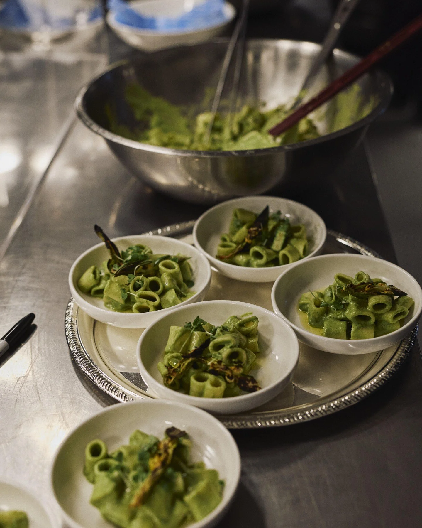 Plating and preparation: where many hands make light work.
