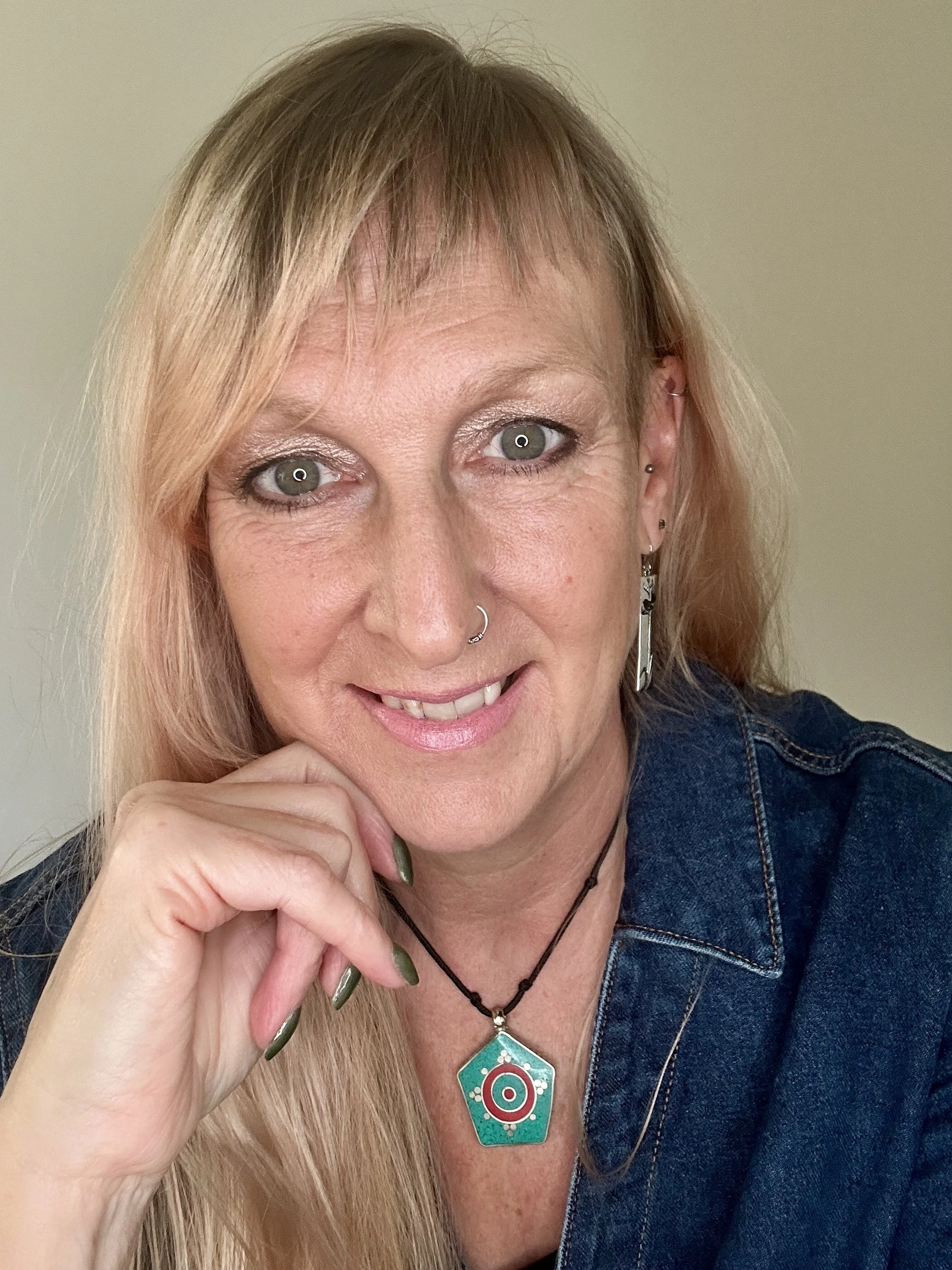 Portrait of Sharon Beaumont, multidimensional artist, author and harmonic guide, creator of The Portal of Nine and harmonic frequency artworks.