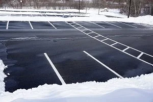 What Goes into Plowing a Parking Lot?