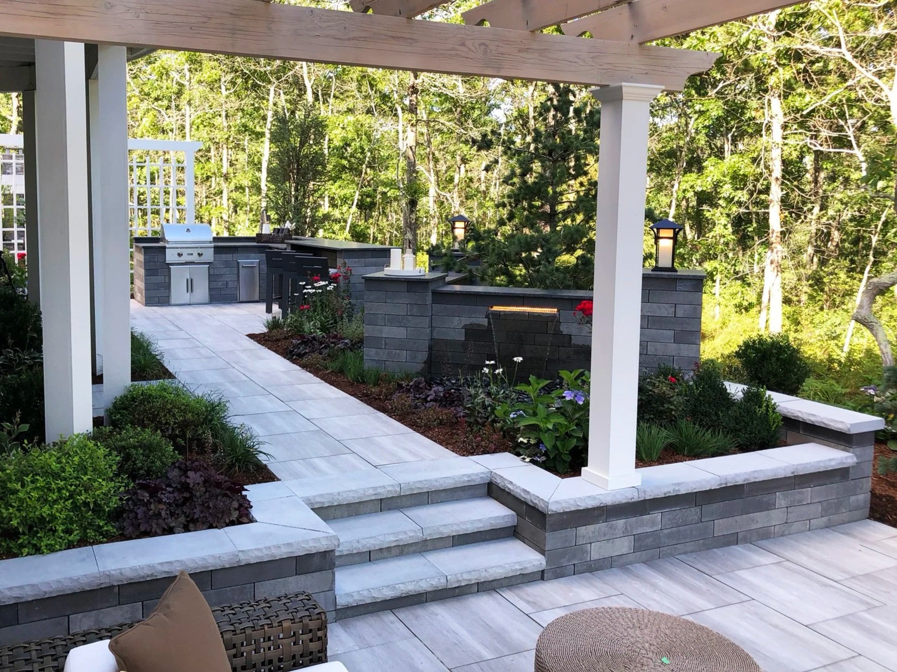 How a Retaining Wall Turns an Uncooperative Slope Into Usable Outdoor Space in Middleborough, MA