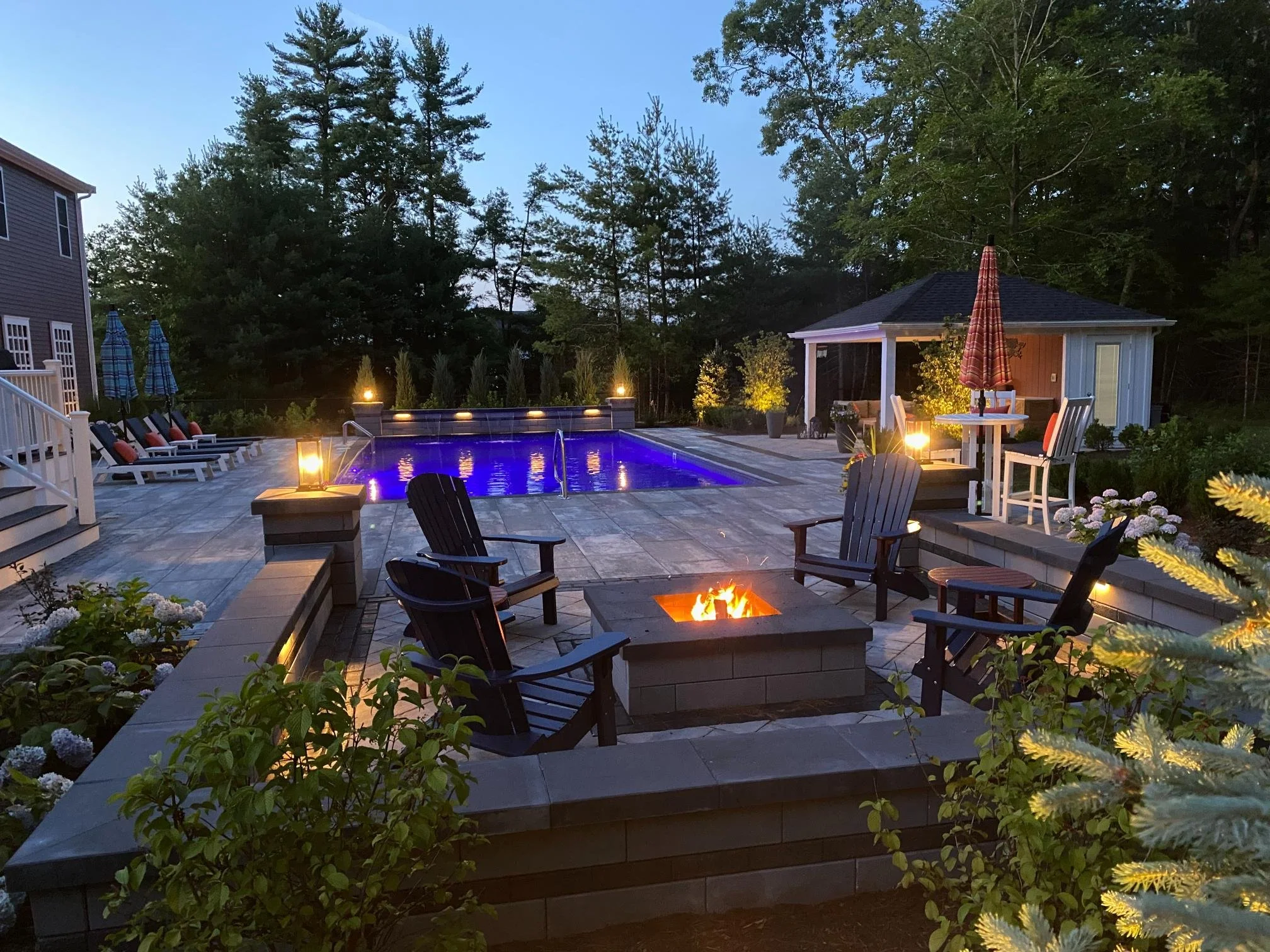 Outdoor lighting highlighting trees in Kingston, MA