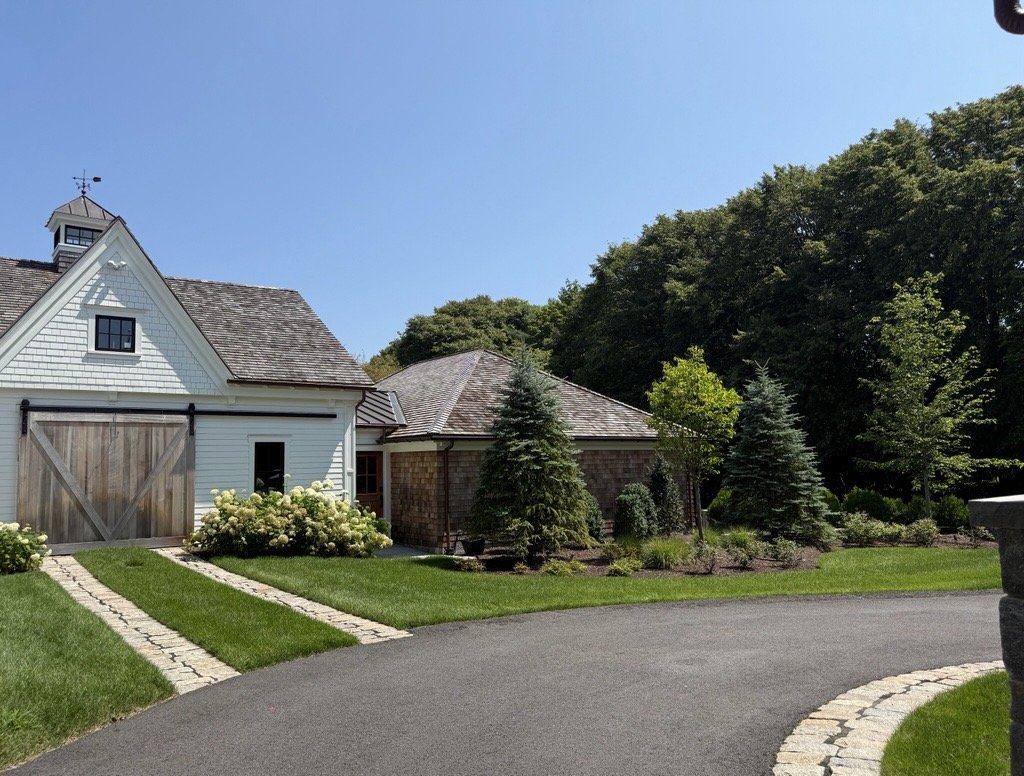 Landscaping company maintaining property in Plymouth, MA