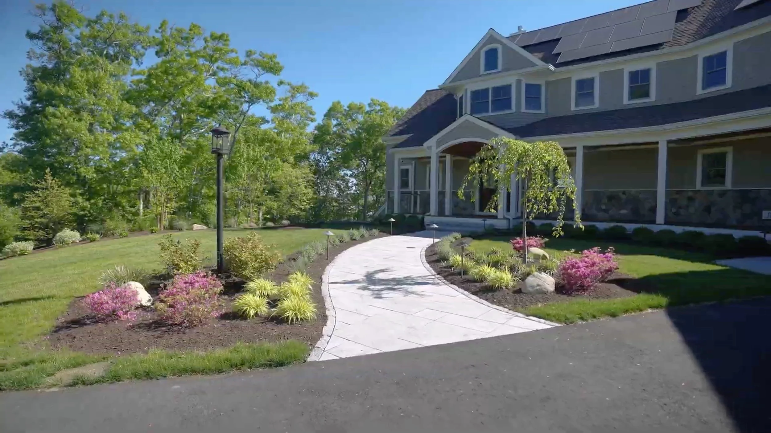 Granite, cobbleston, traventine porcelain walkways in front entrance